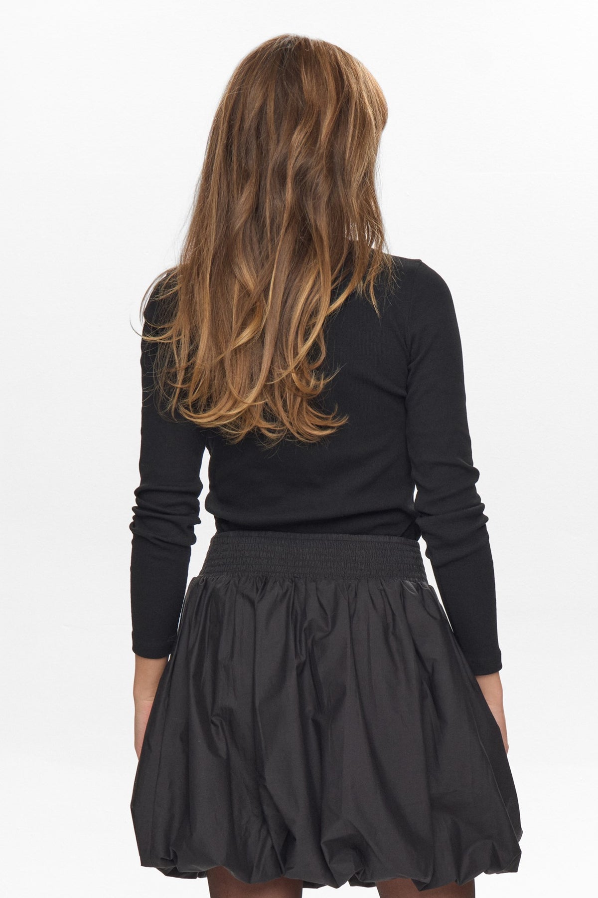 Back view of Numph Nunima black skirt with bubble silhouette