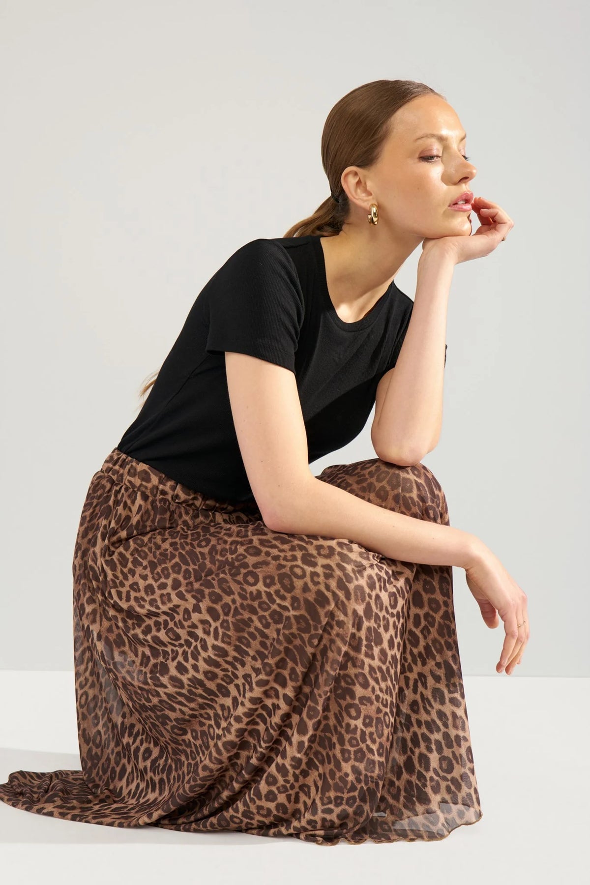 Nümph Nulionis Tiger’s Eye animal print midi skirt – seated styling view