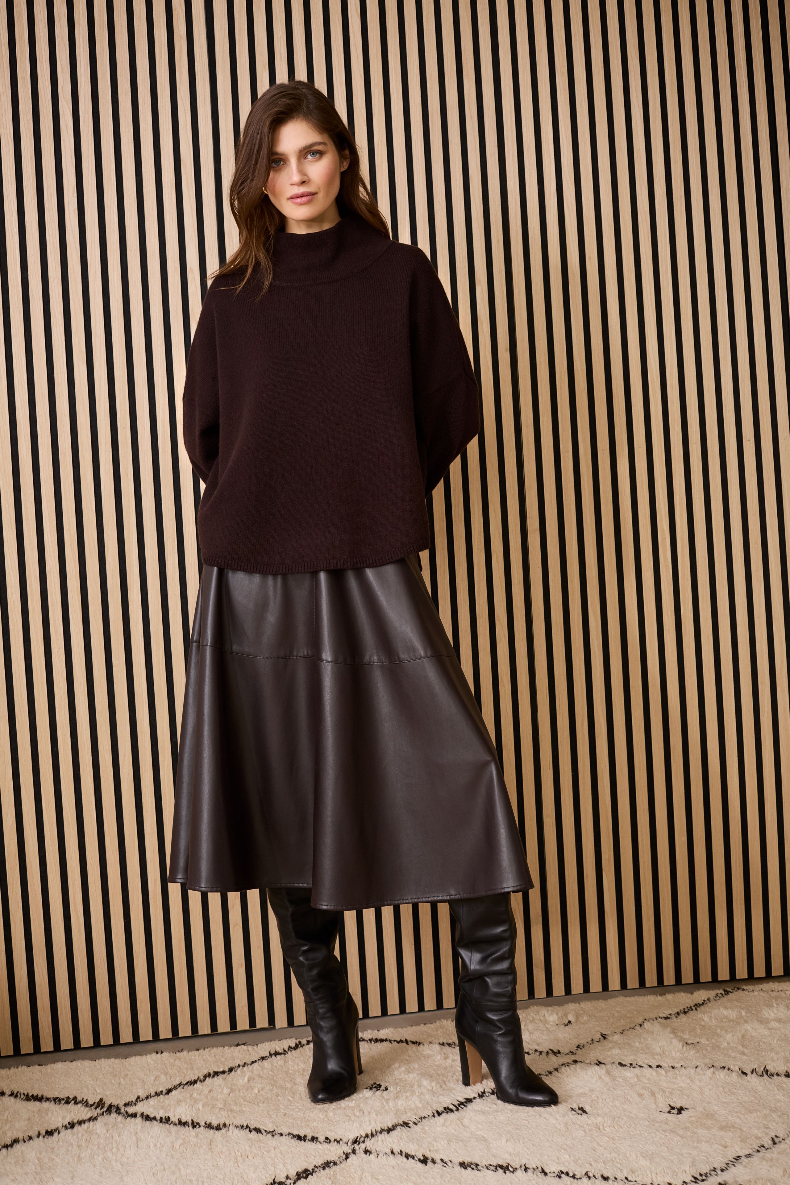 Oui chocolate faux-leather A-line midi skirt — styled with knit and boots