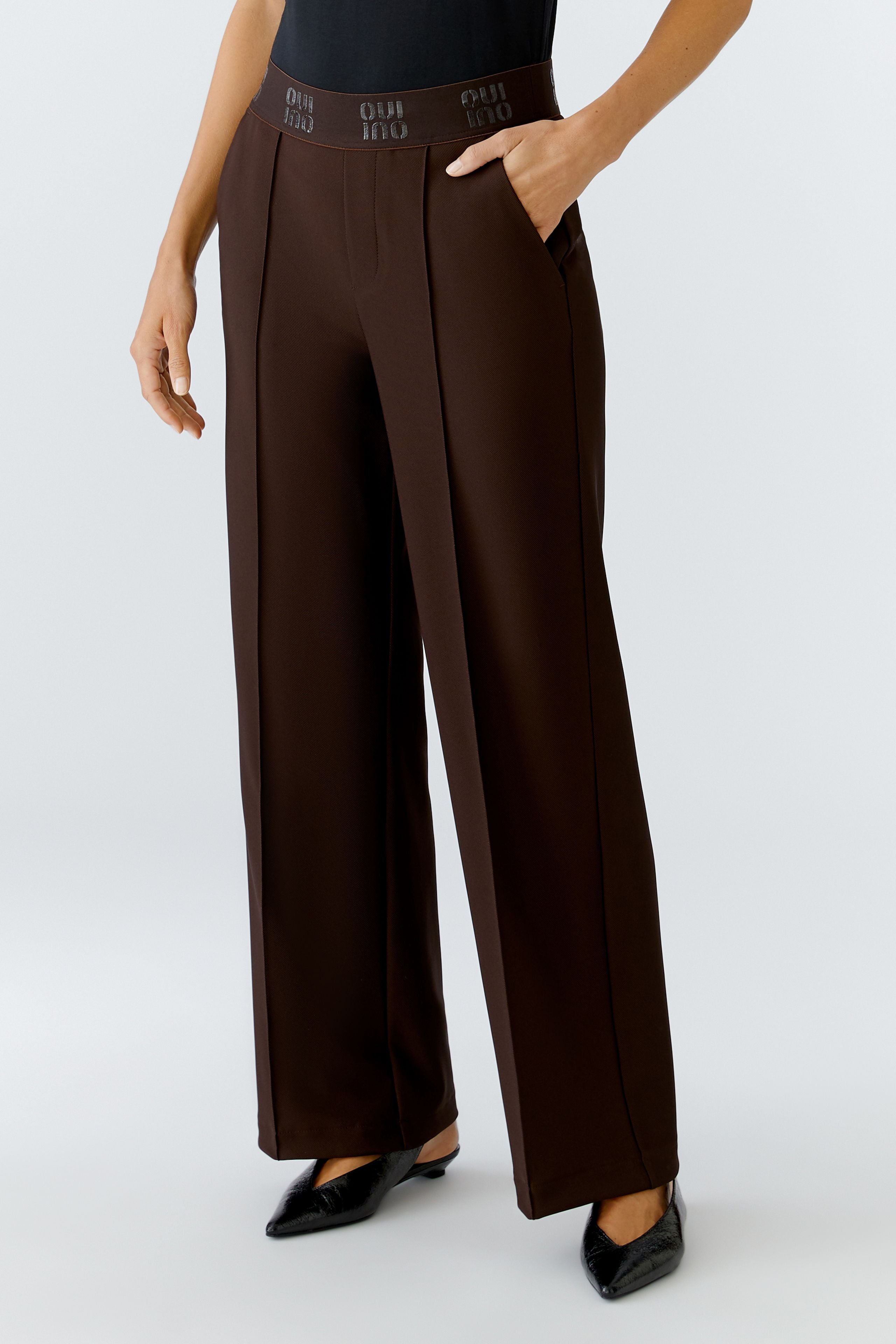 Oui brown trousers — elastic waistband with subtle logo, pocket detail