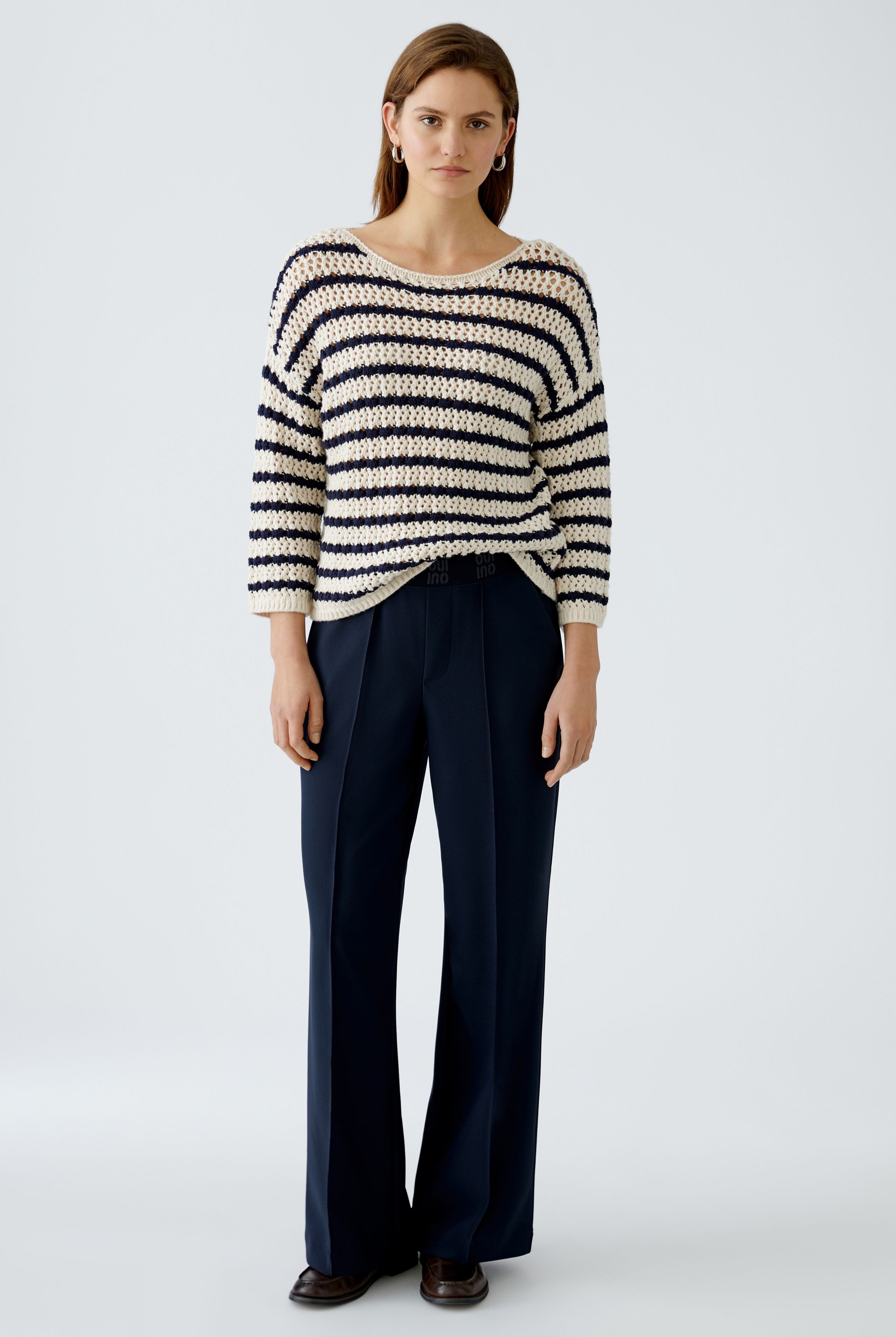Oui navy technical pull on jersey trousers — front view on model