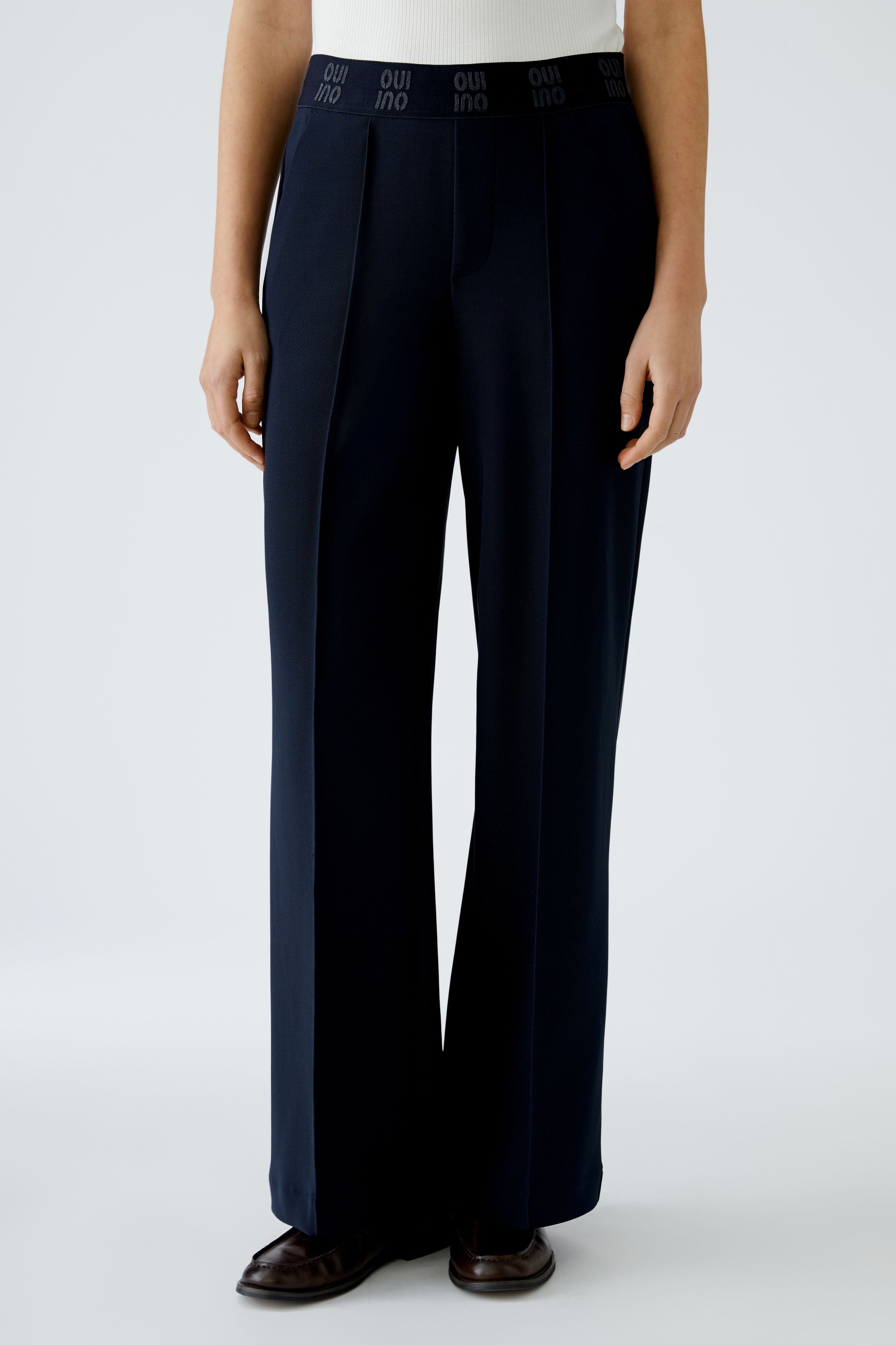 Oui navy technical jersey trousers — full length, straight leg