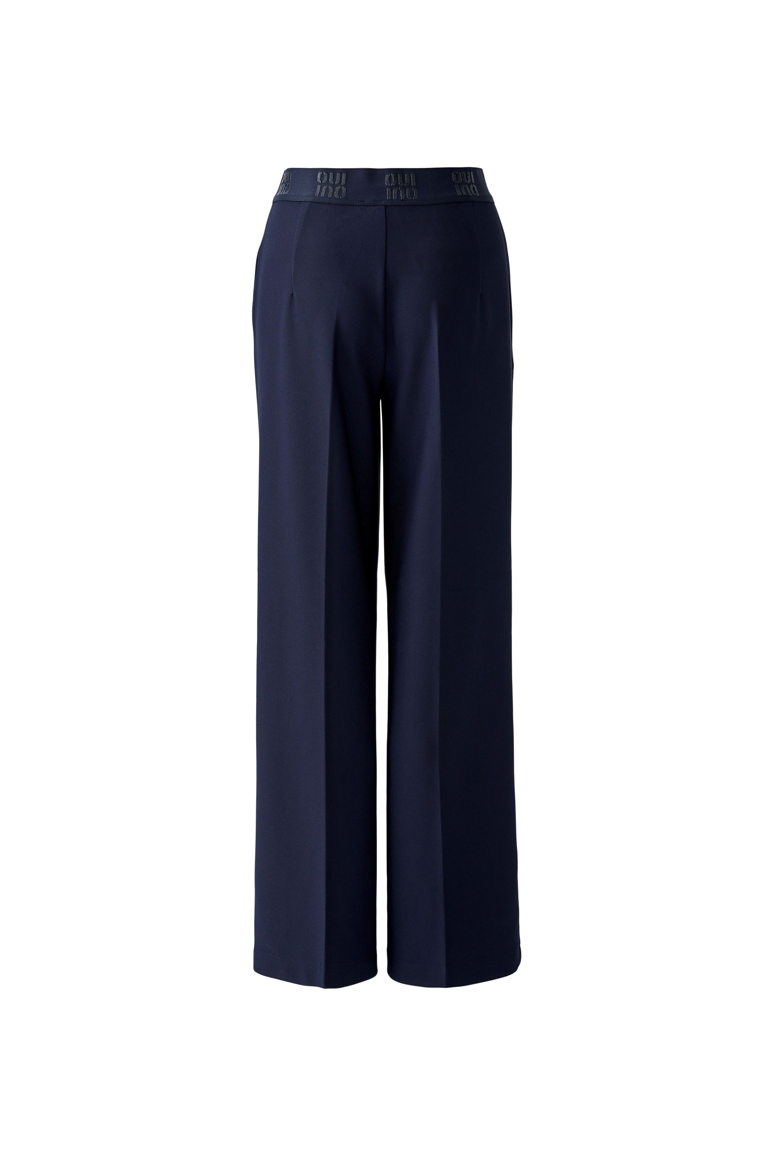 Oui navy technical jersey trousers — studio packshot, back