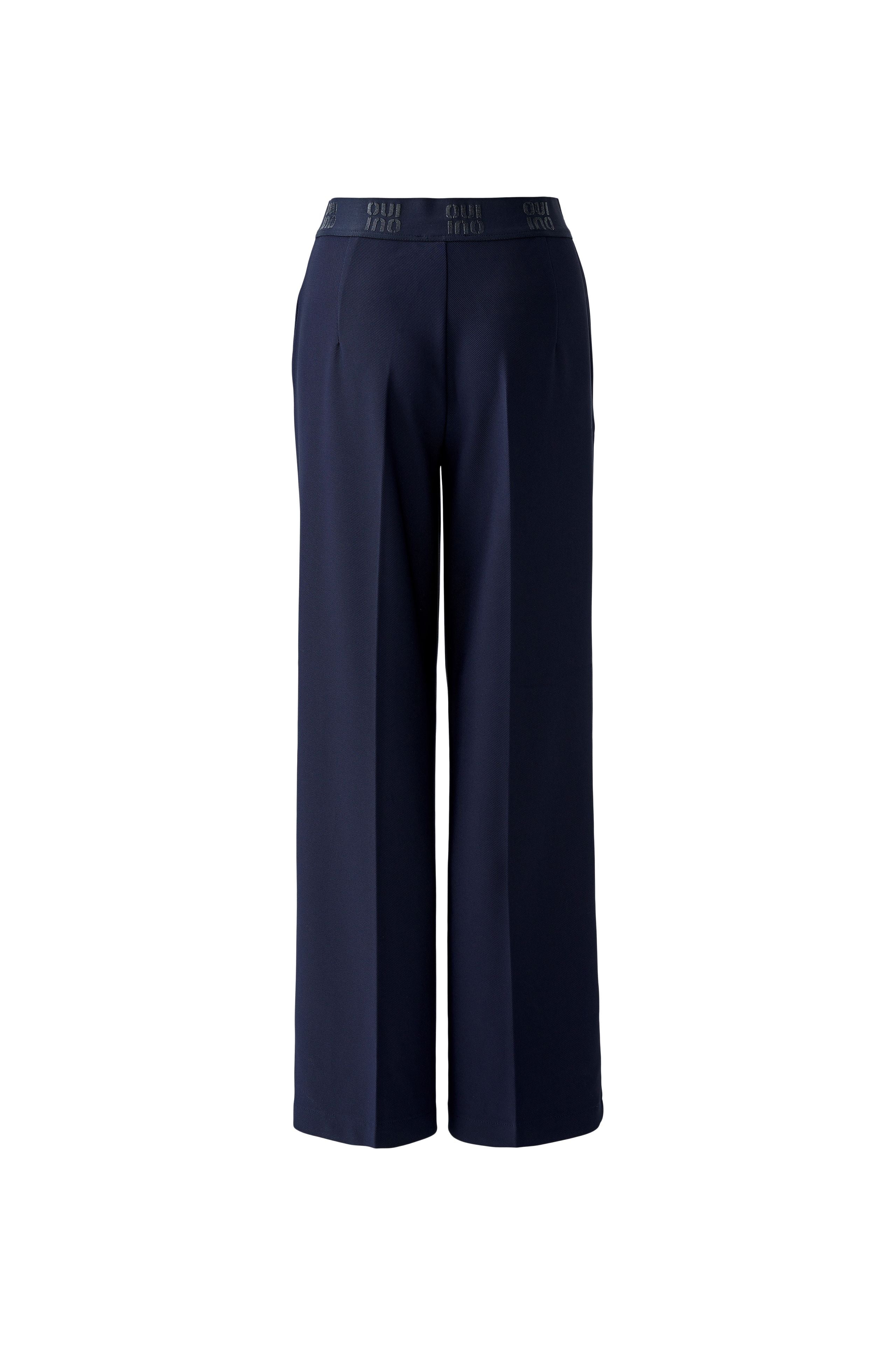 Oui navy technical jersey trousers — studio packshot, back