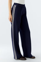 Oui Side view of navy slip-on trousers with sporty contrast stripes and wide-leg cut