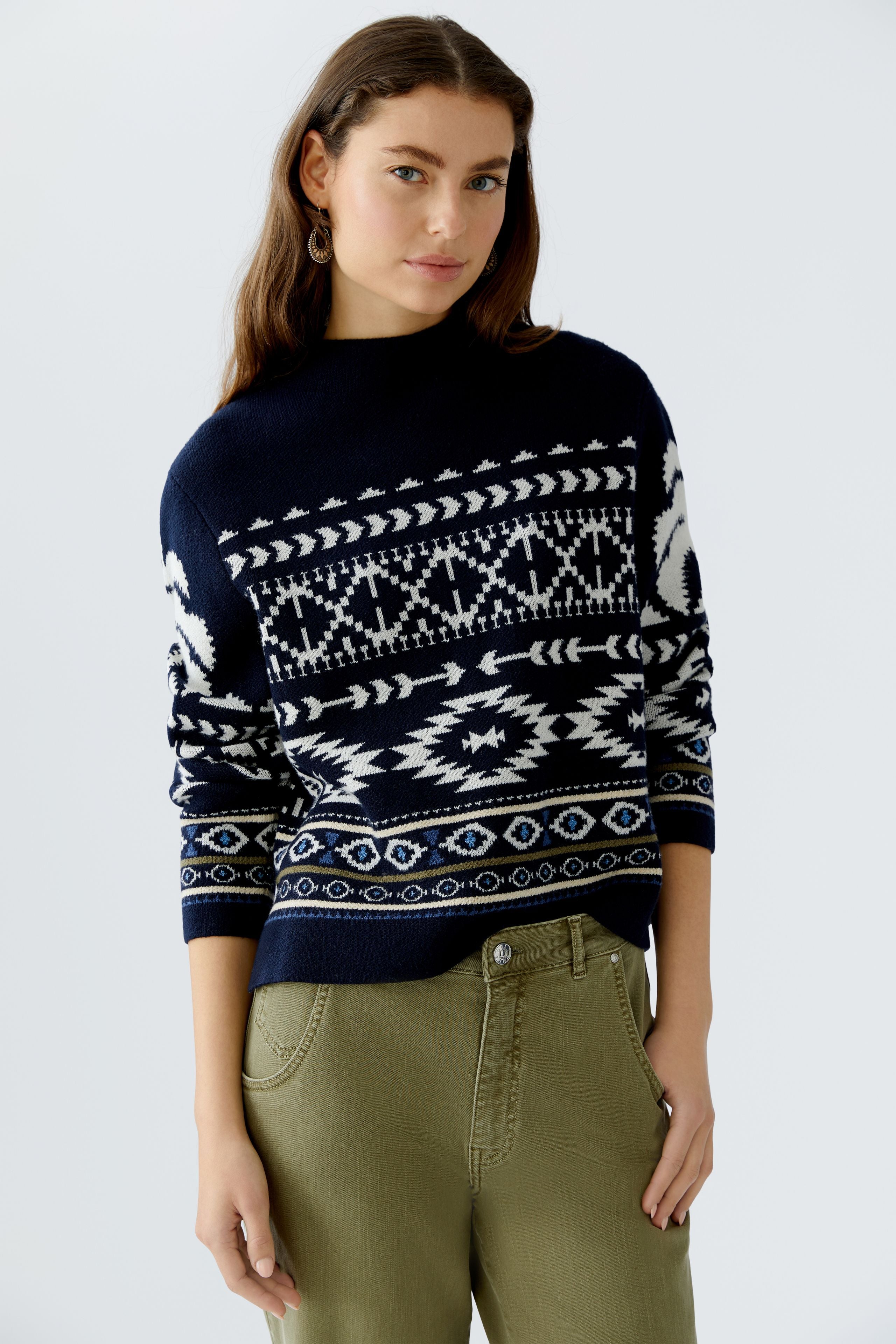 Model wearing Oui navy Norwegian jumper with cropped fit and jacquard knit