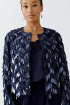 Oui sequin jacket styled over matching navy set