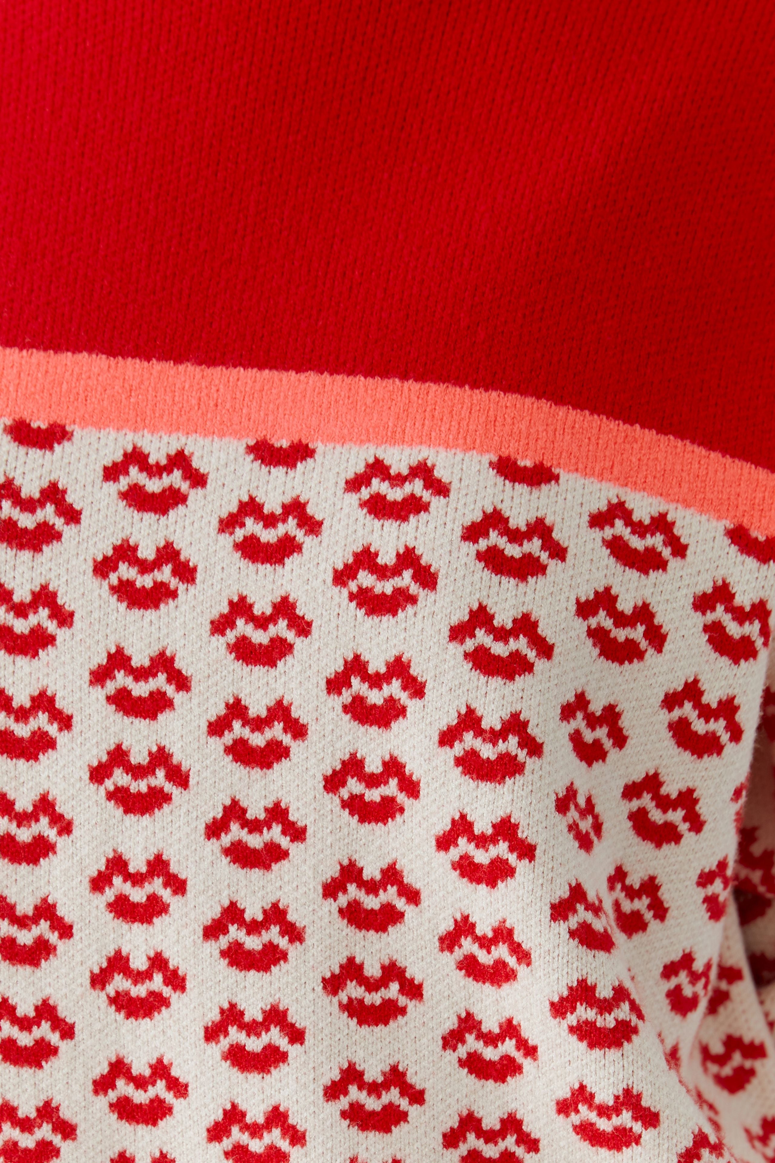 Close-up of Oui lip print design in red and white