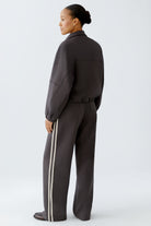 Back angled view of Oui jacket with collar and sleeve detail