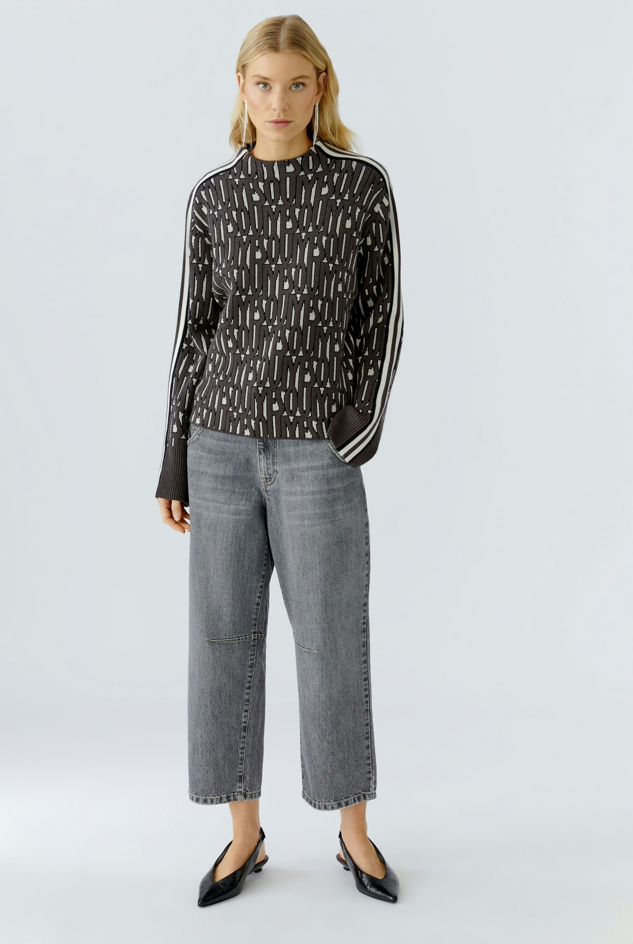 Oui sporty knitted letter print jumper styled with cropped jeans, full front view highlighting slightly cropped length
