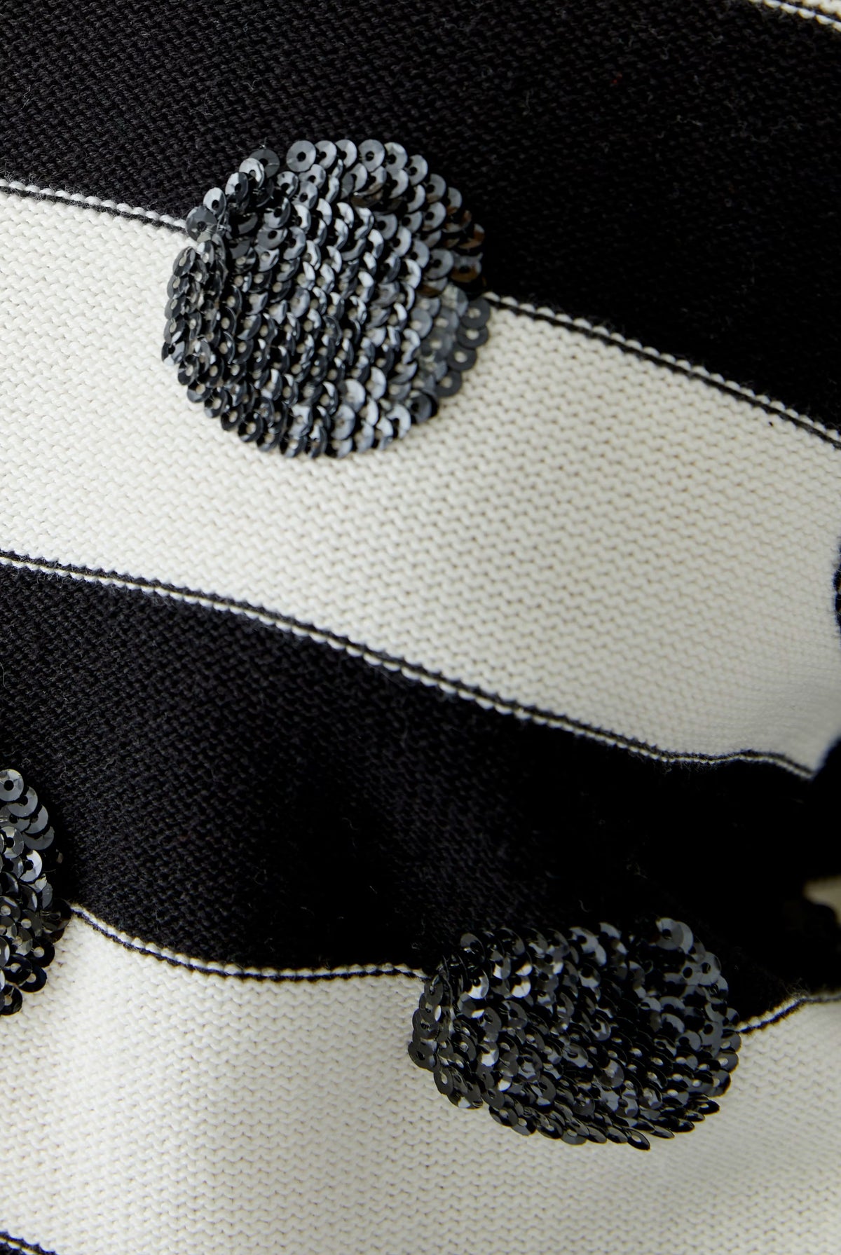 Oui black and white striped jumper with oversized sequin dots – close-up detail