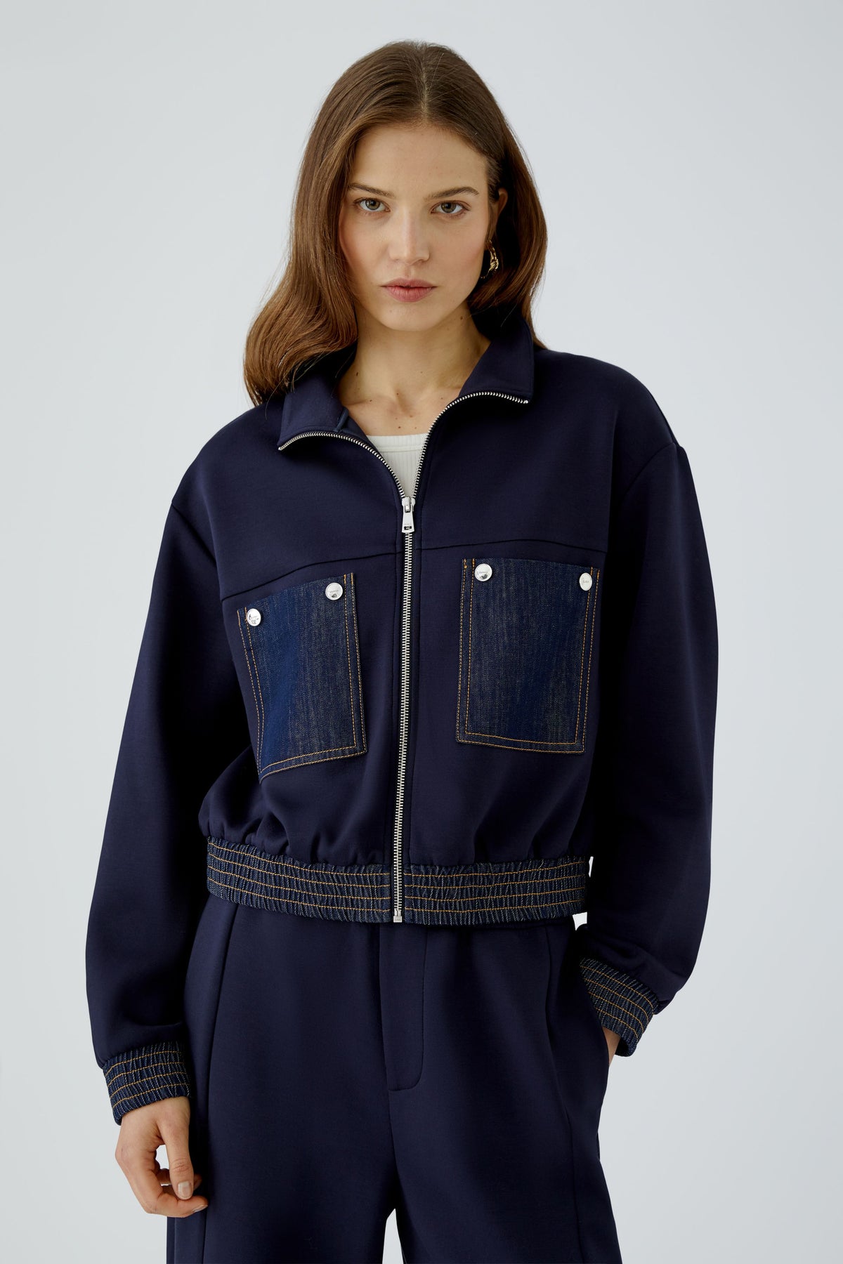 Oui navy scuba blouson jacket with denim patch pockets – front model view