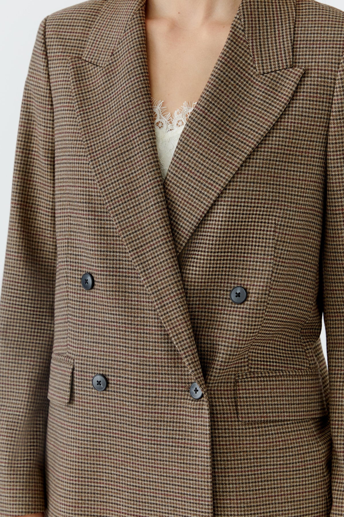 Oui brown micro-check blazer showing dark buttons, peaked lapels and woven check pattern – detail view
