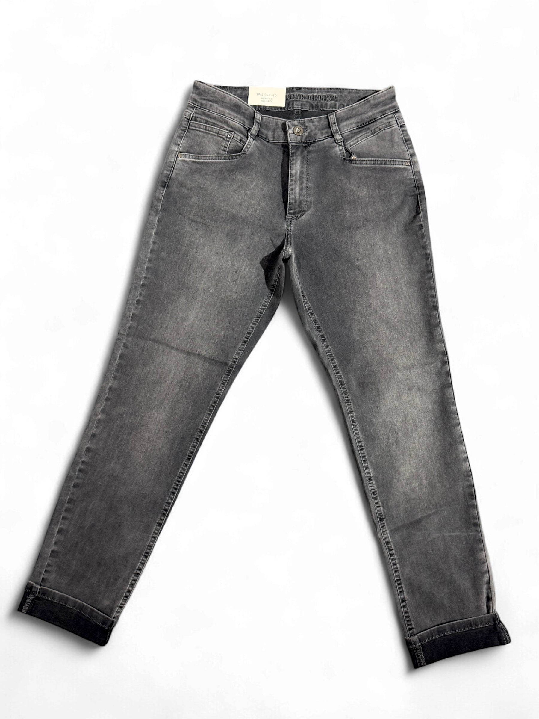 Laid flat front view of grey slim leg jeans