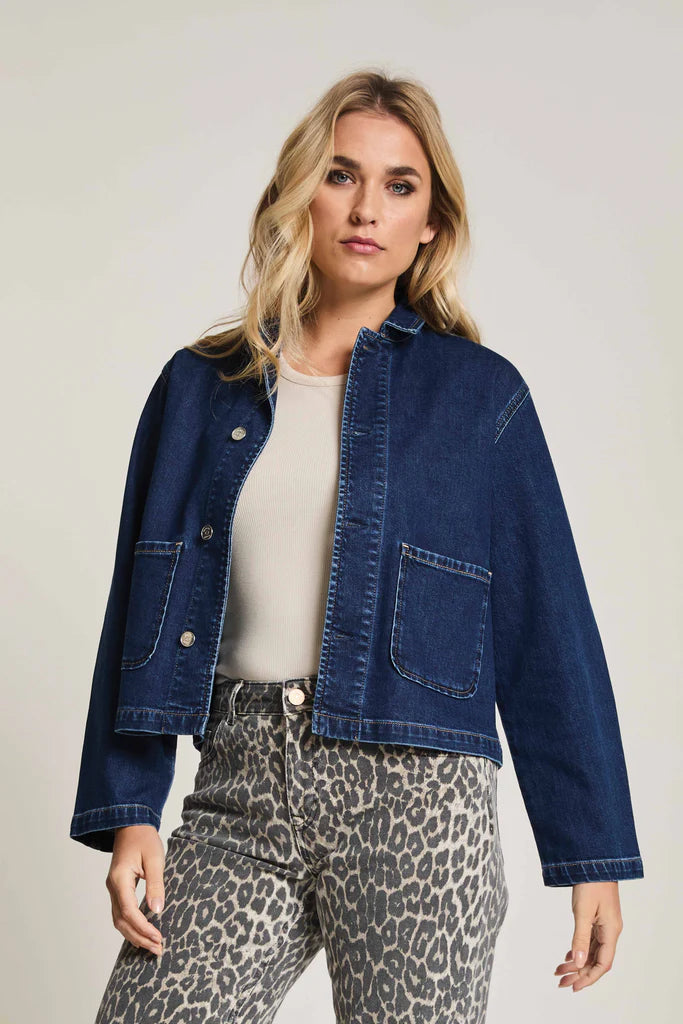 Model wearing oversized dark indigo stretch denim jacket by Para Mi