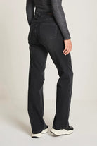 Back view of wide leg high rise black jeans with tonal stitching