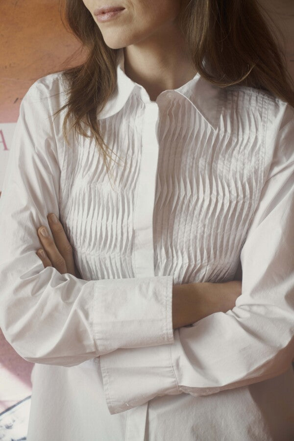 Detailed view of textured smocking on Part Two’s women’s white cotton shirt