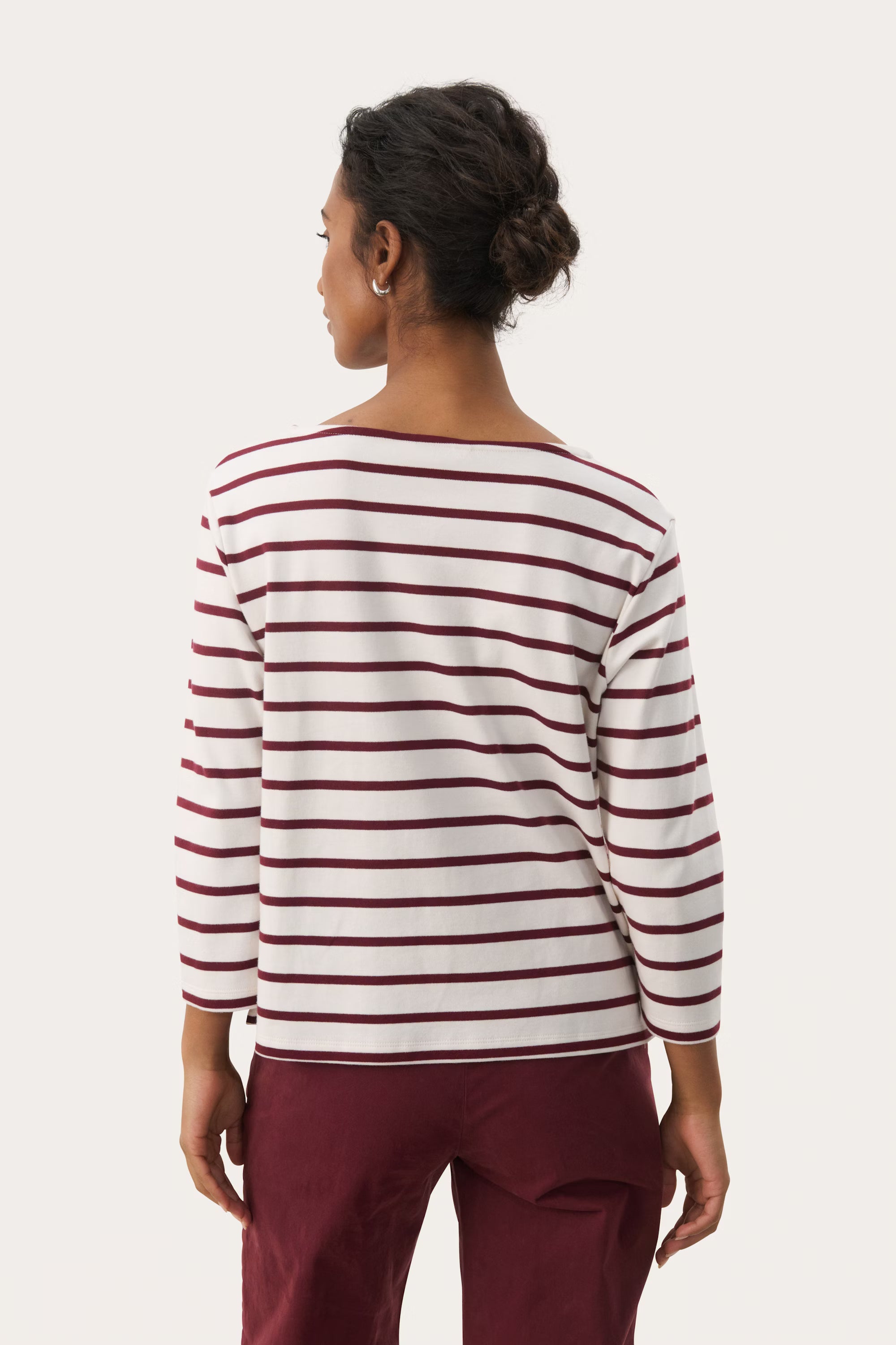 Back view of Part Two NelaPW striped top in cream with burgundy stripes, styled with burgundy trousers.