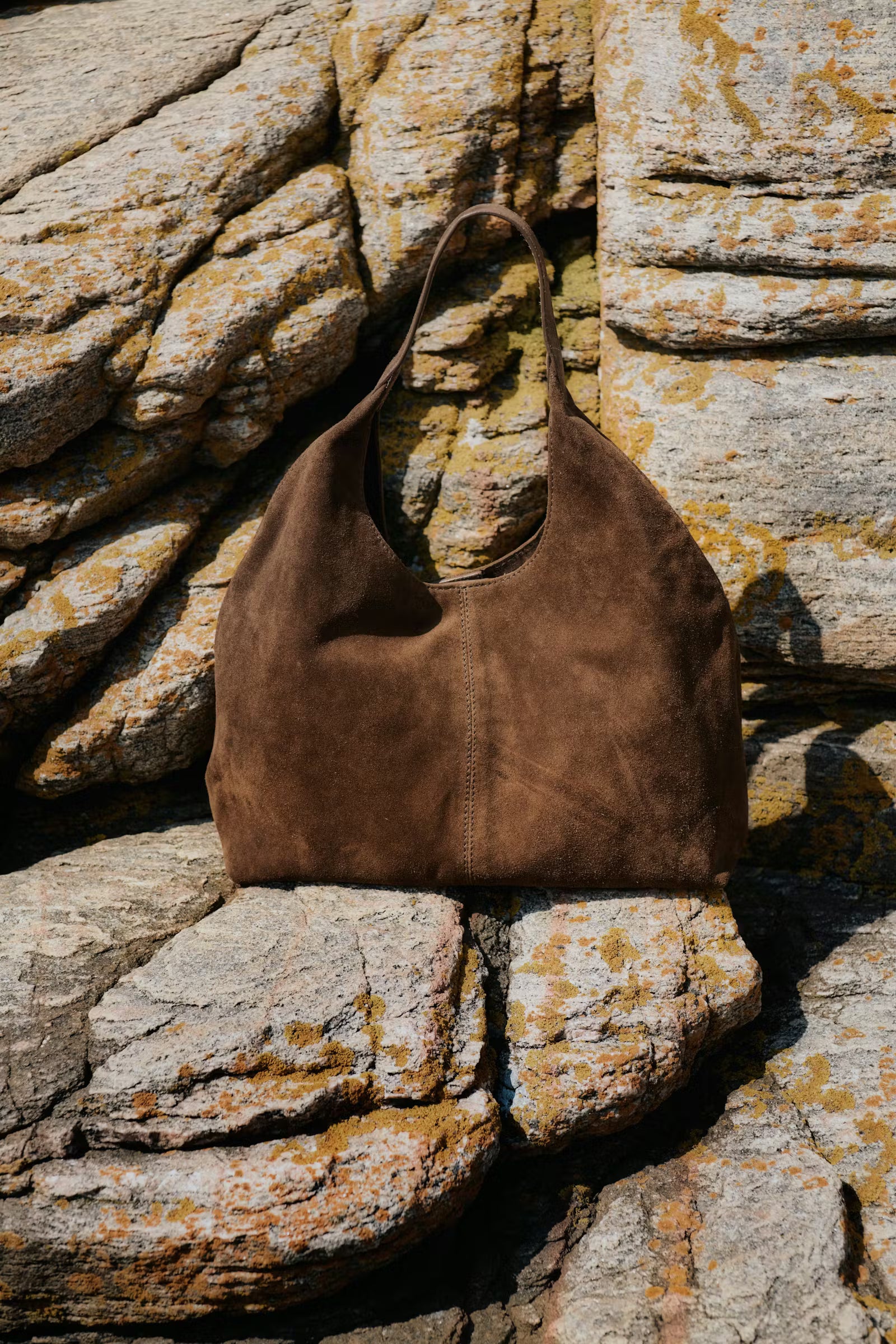 Part Two Athea brown suede bag outdoors