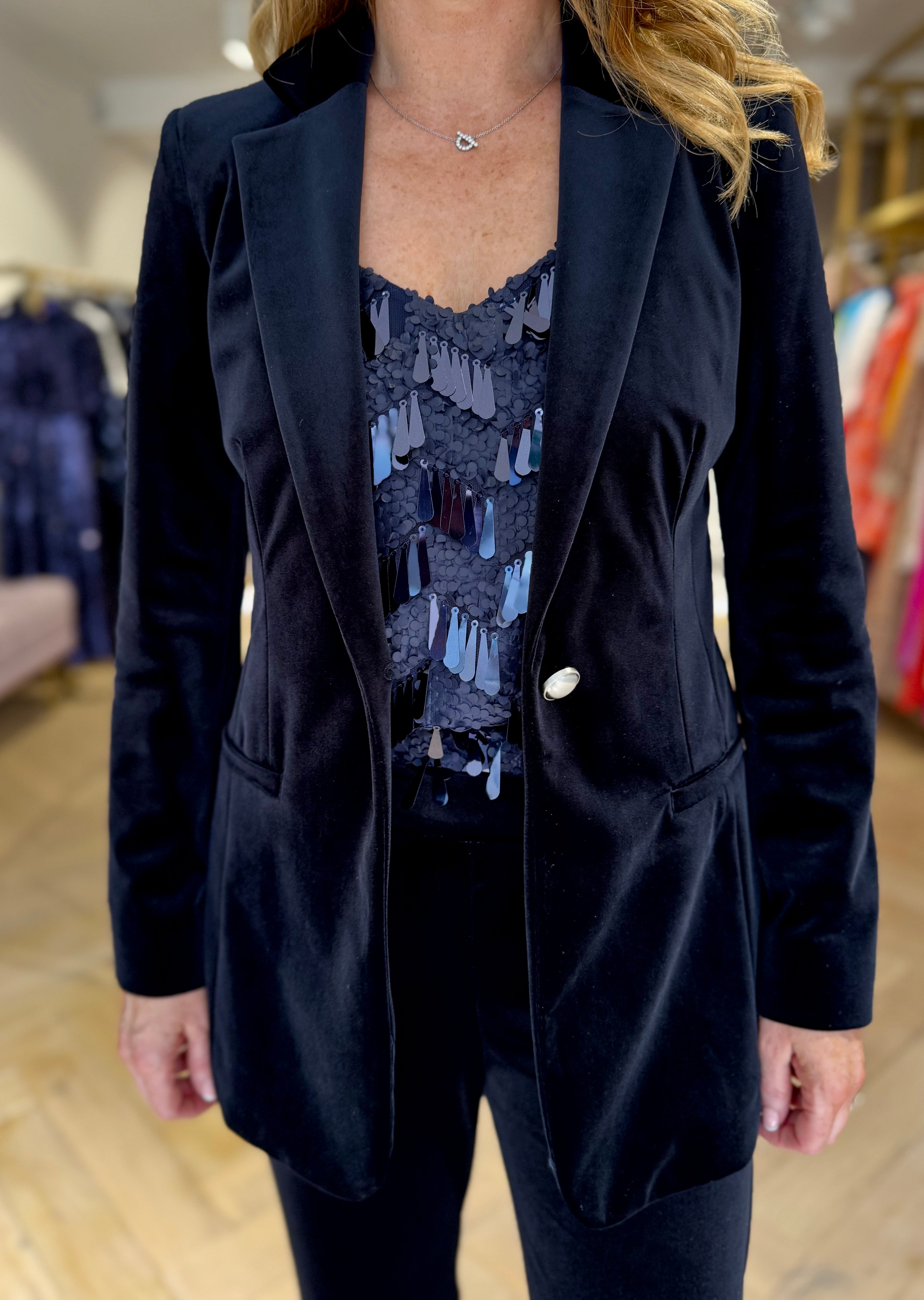 Back view of tailored navy velvet blazer by Penny Black