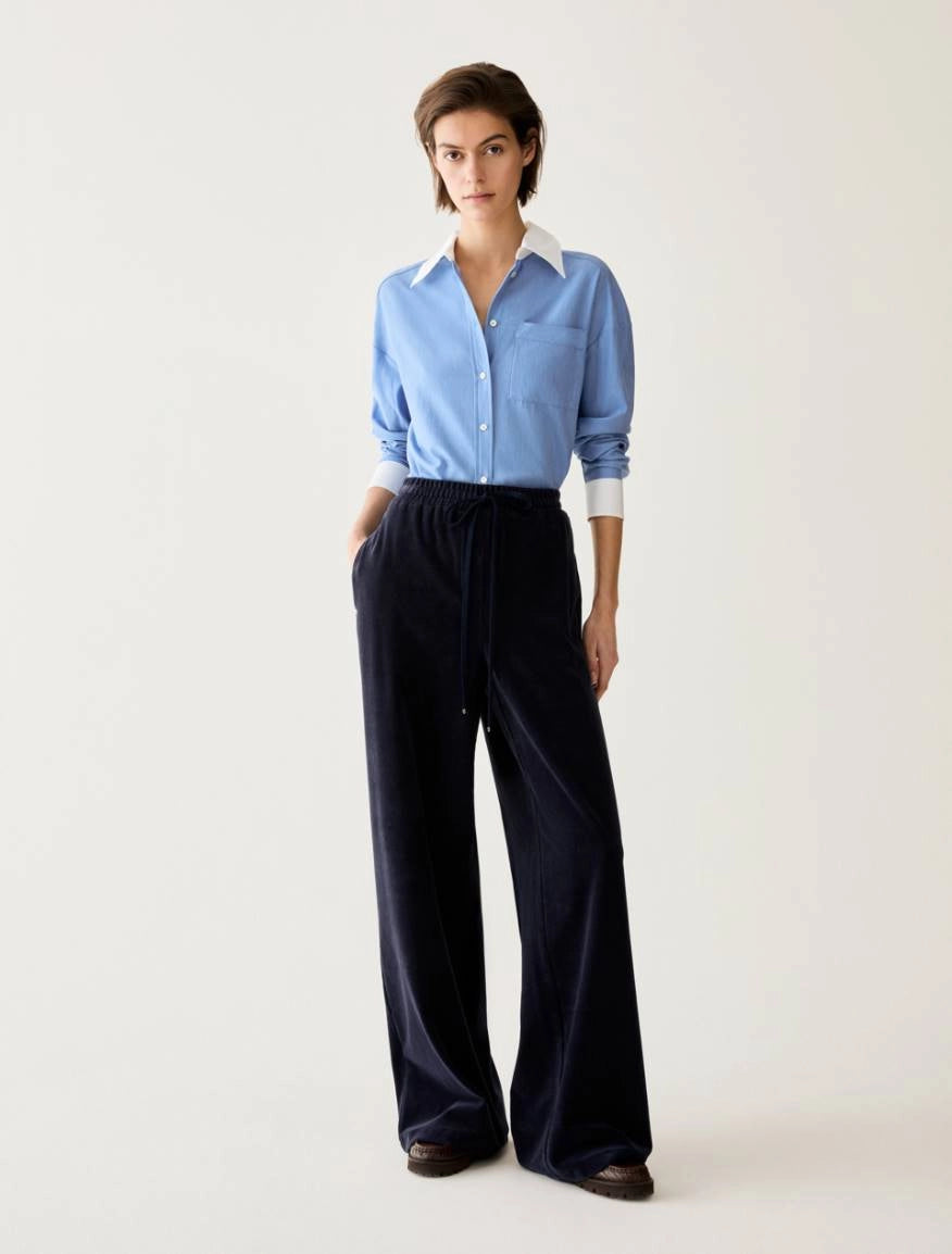 Pennyblack Vischio navy relaxed wide-leg trousers styled with a blue shirt – full model view