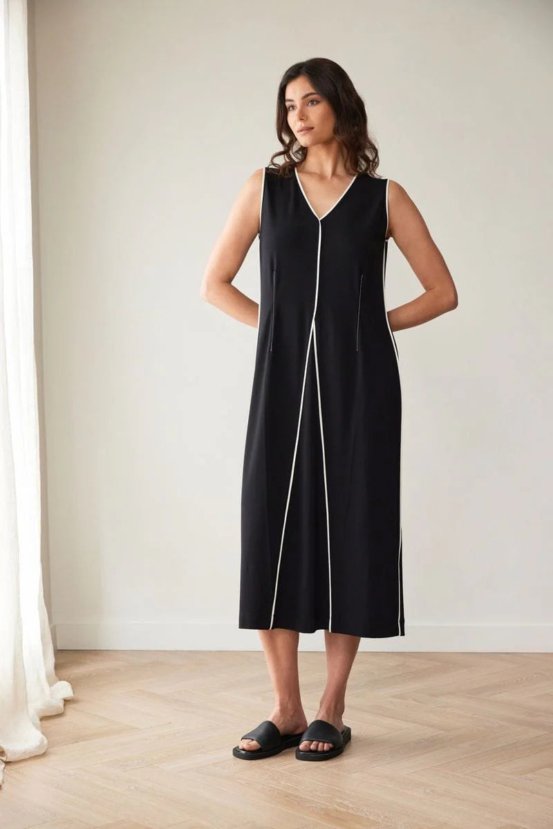 Peruzzi sleeveless midi dress showing subtle piped detailing and flattering drape