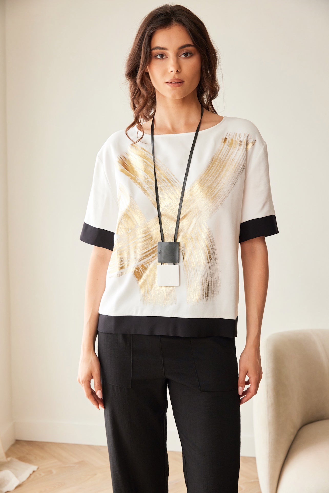 Peruzzi Metallic Brush Stroke Print Top front view with gold brush stroke design