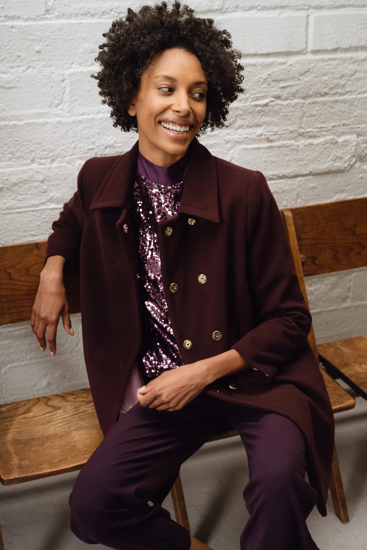 Close up view of Sisters Havana mini skirt outfit, showing structured tailoring and clean lines