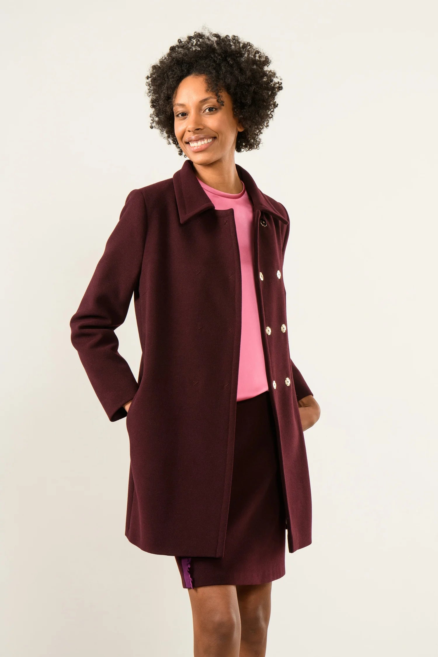 Sisters Smart casual burgundy mini skirt styled with matching coat