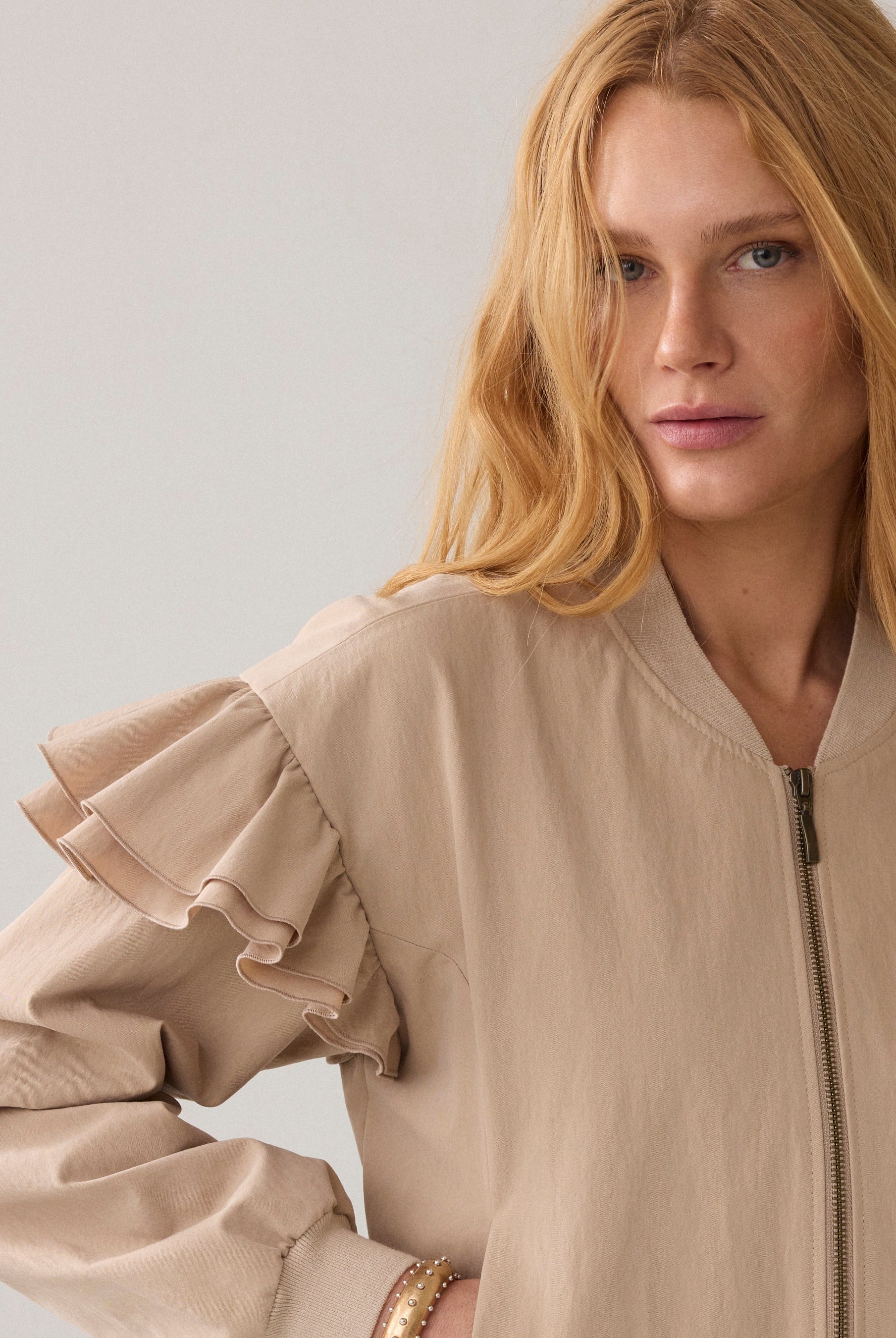 Close-up of Summum bomber jacket frill shoulder detail