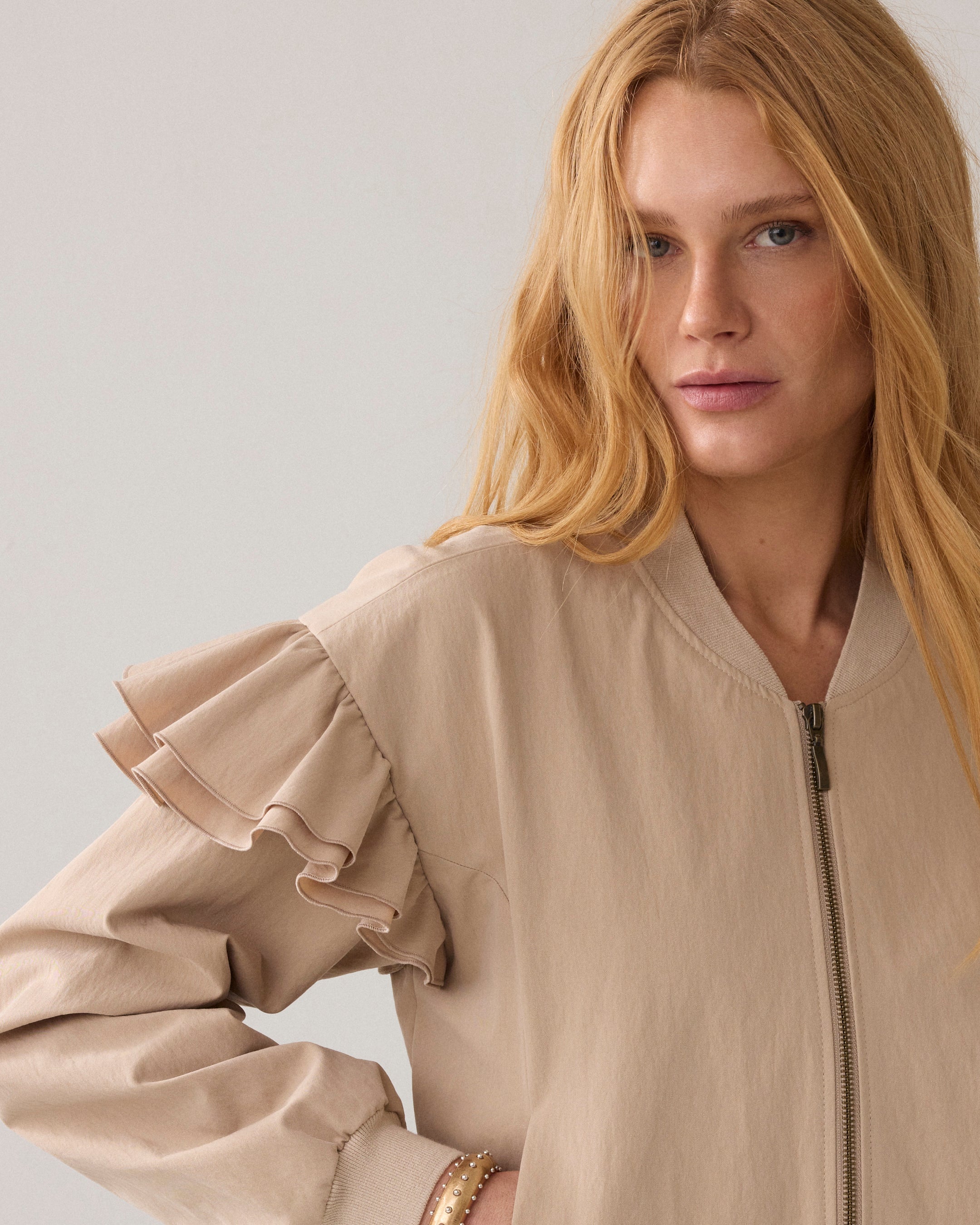 Close-up of Summum bomber jacket frill shoulder detail