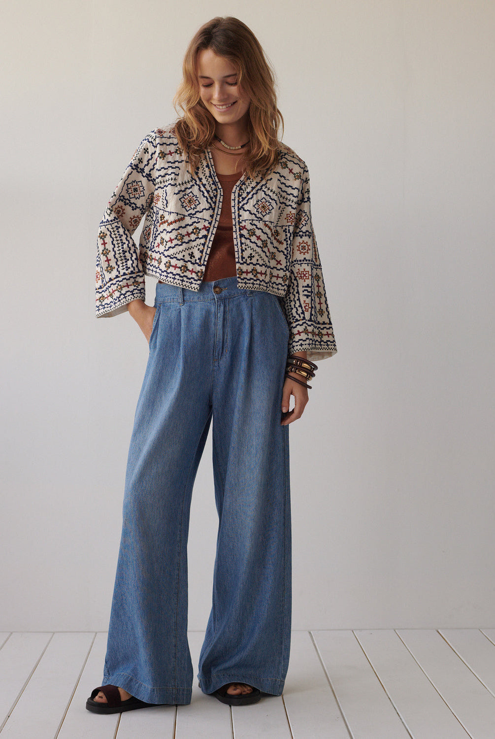 Summum geometric embroidered jacket neckline detail