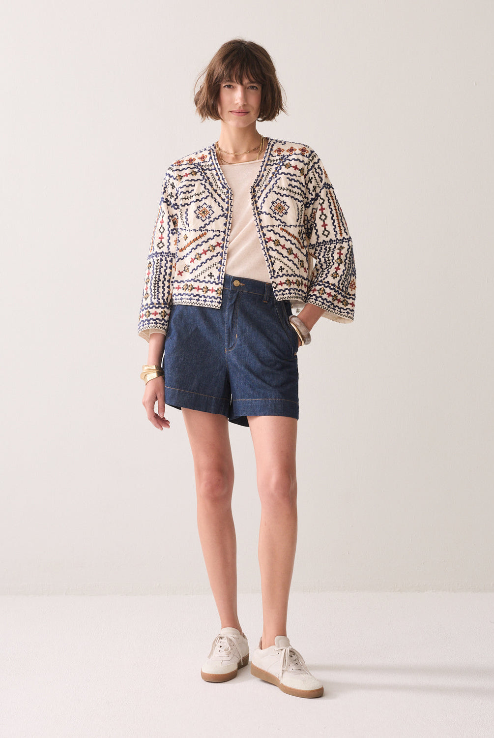 Summum embroidered jacket styled with denim shorts