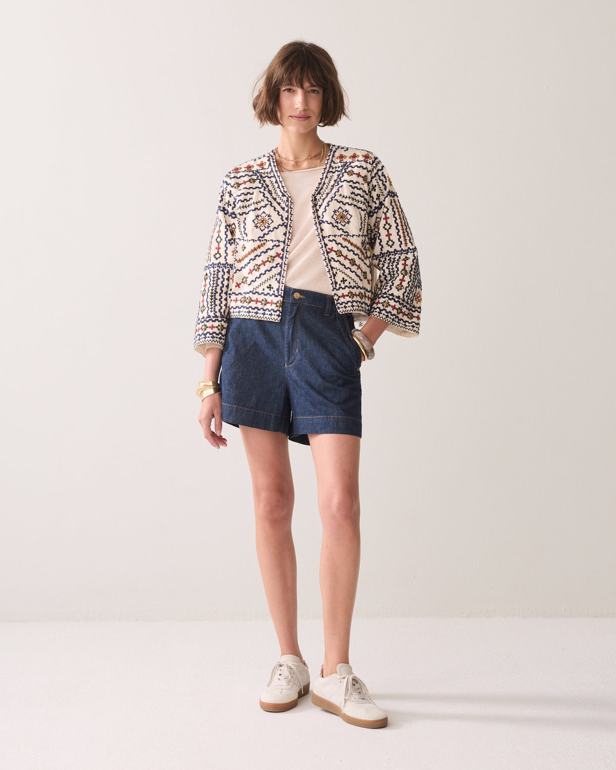 Summum embroidered jacket styled with denim shorts