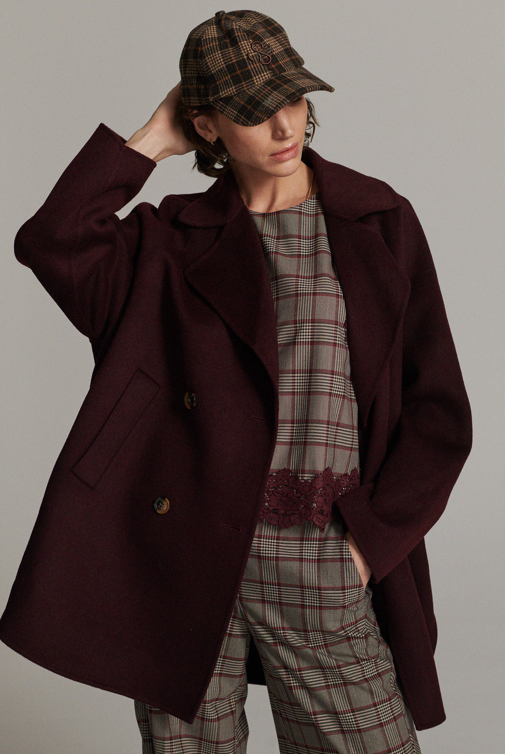Summum burgundy wool blend coat styled with checked outfit