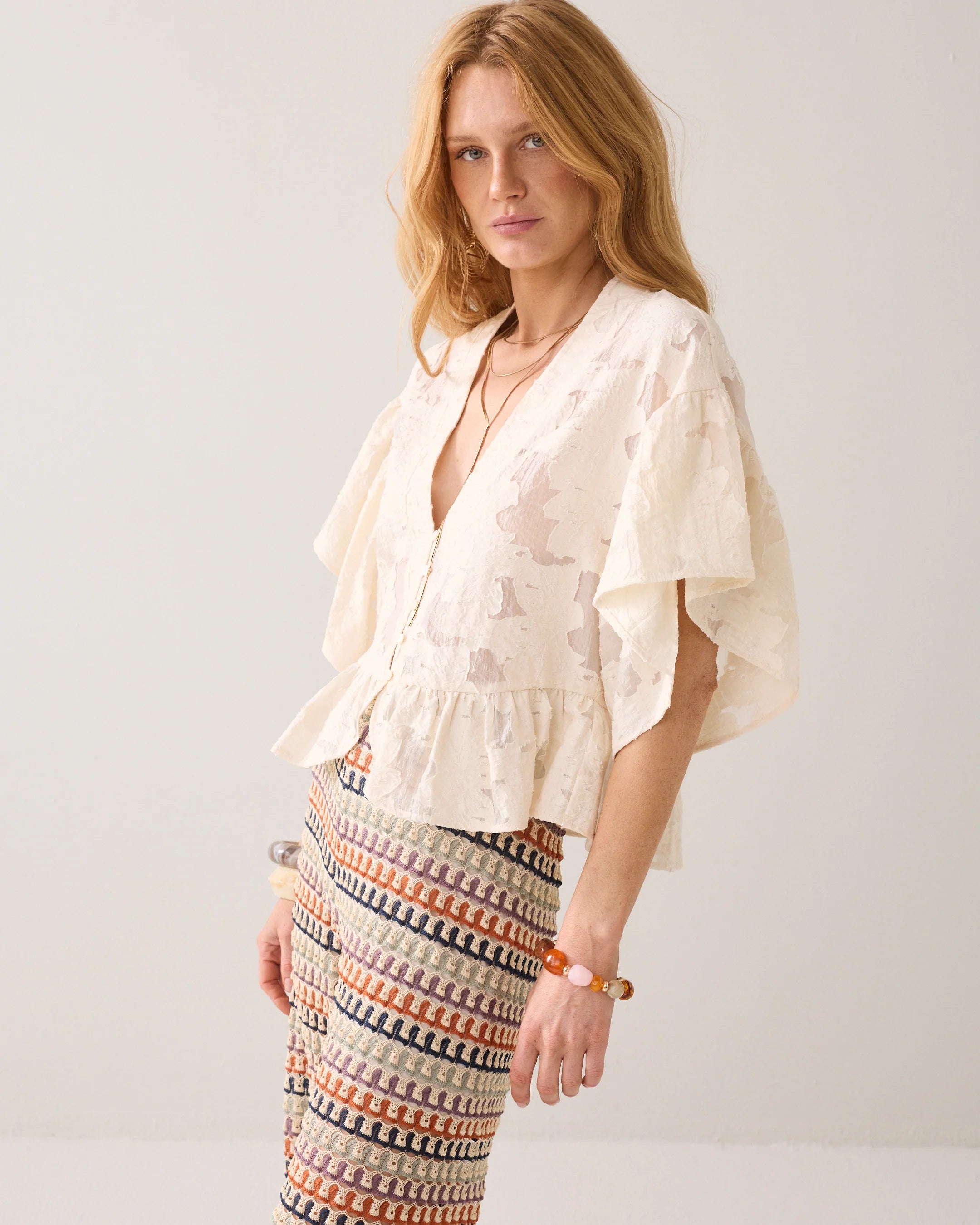 Summum cream V neck blouse with scallop shell buttons