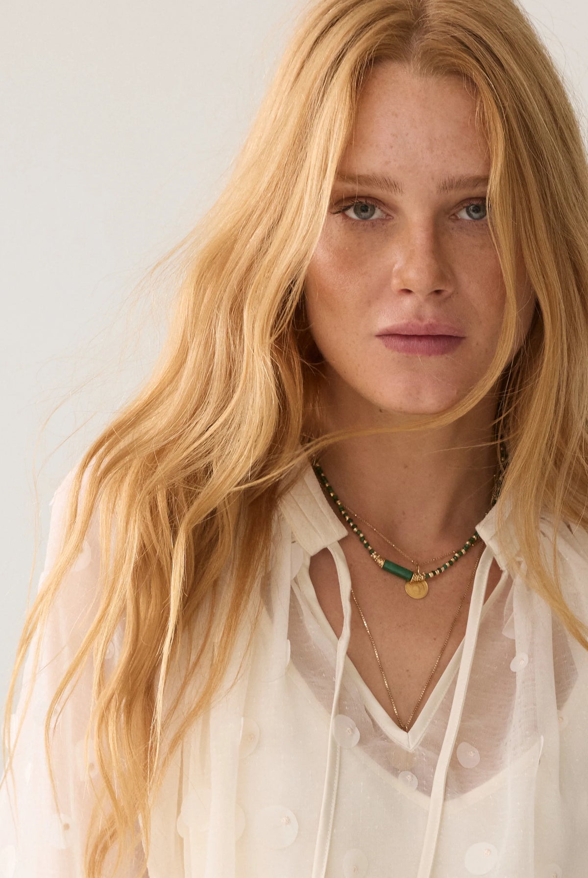 Summum cream embellished blouse – neckline and satin pleat detail