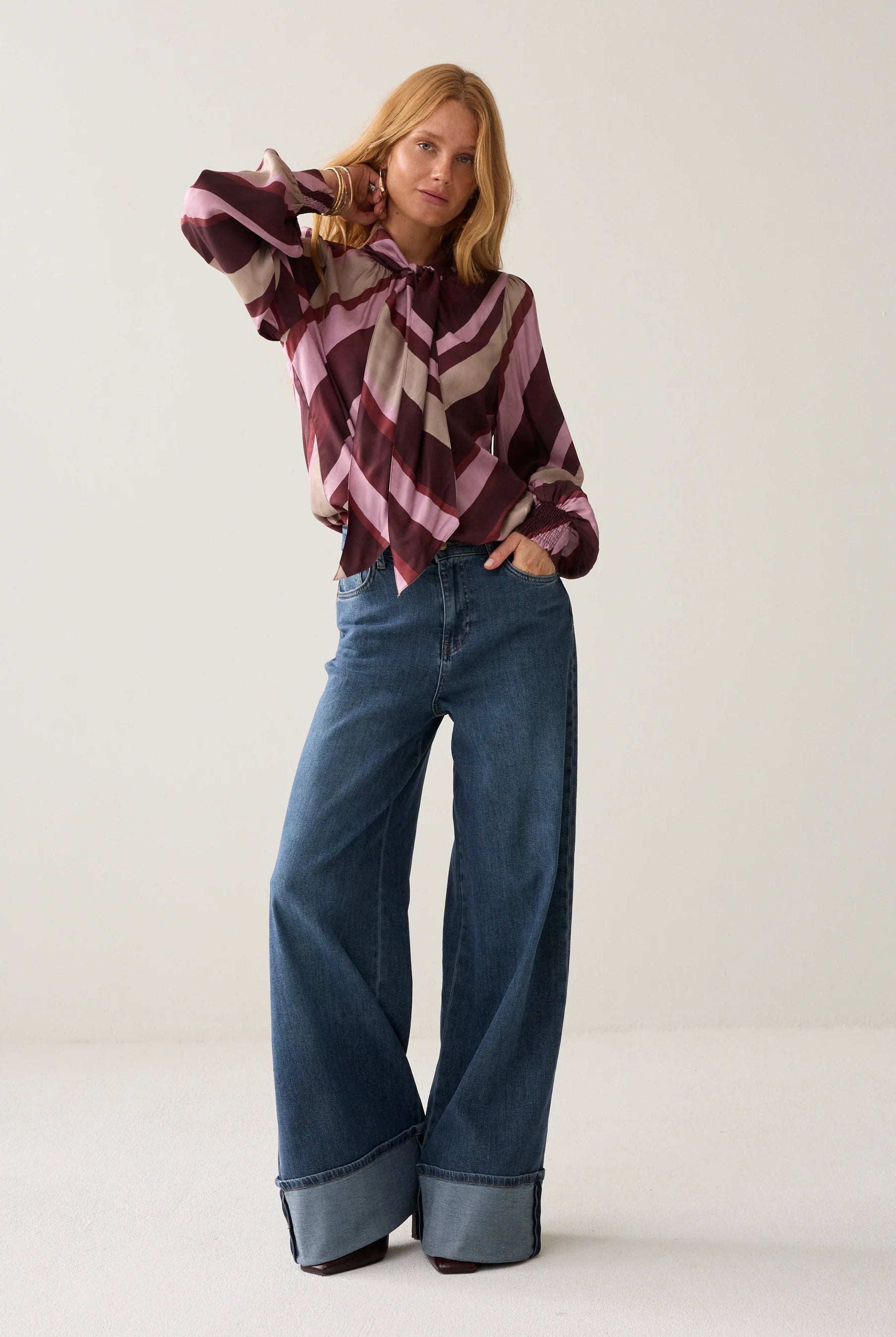 Summum striped blouse styled with wide leg jeans