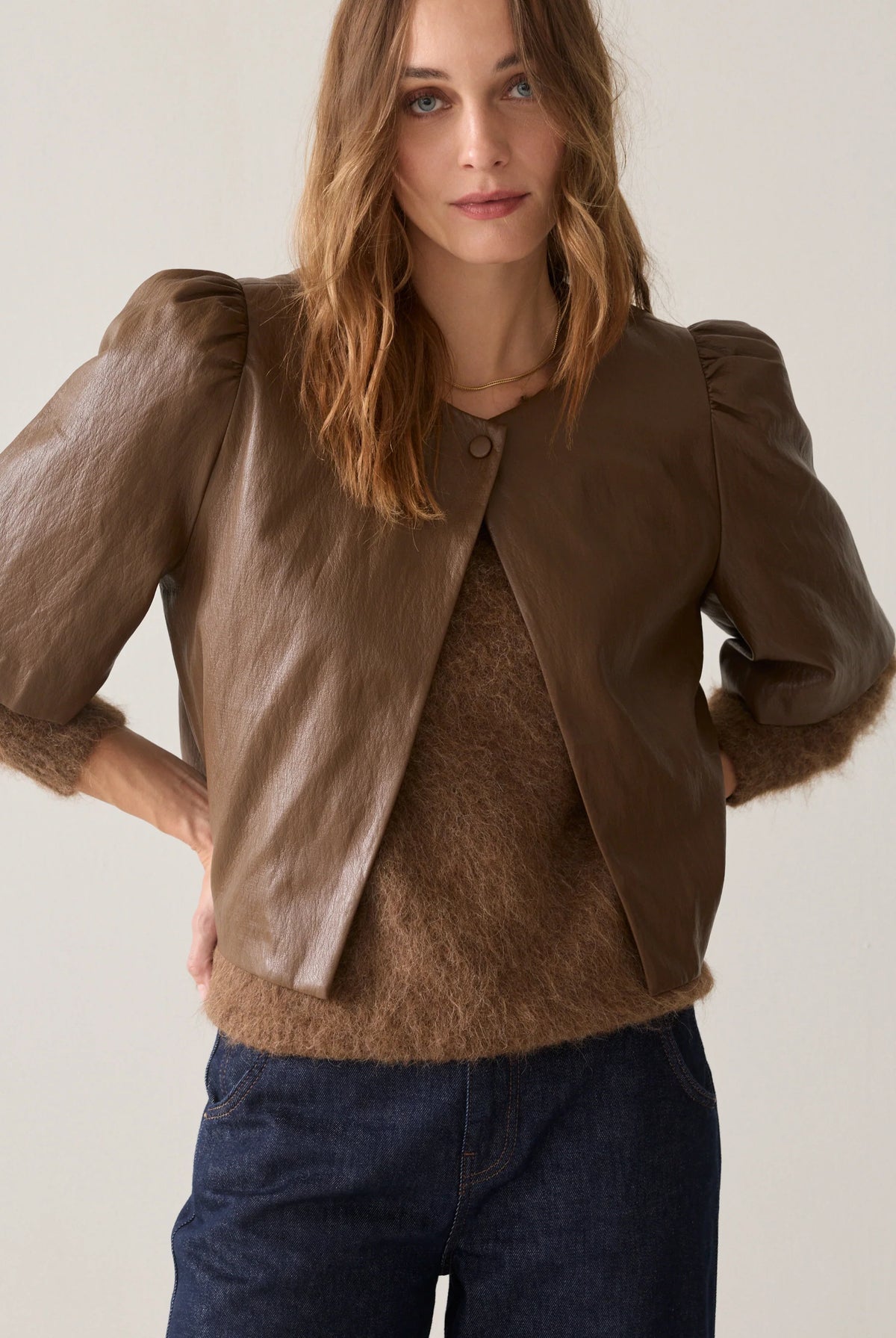 Summum tan brown faux leather puff sleeve jacket worn over a matching brown top – front model view