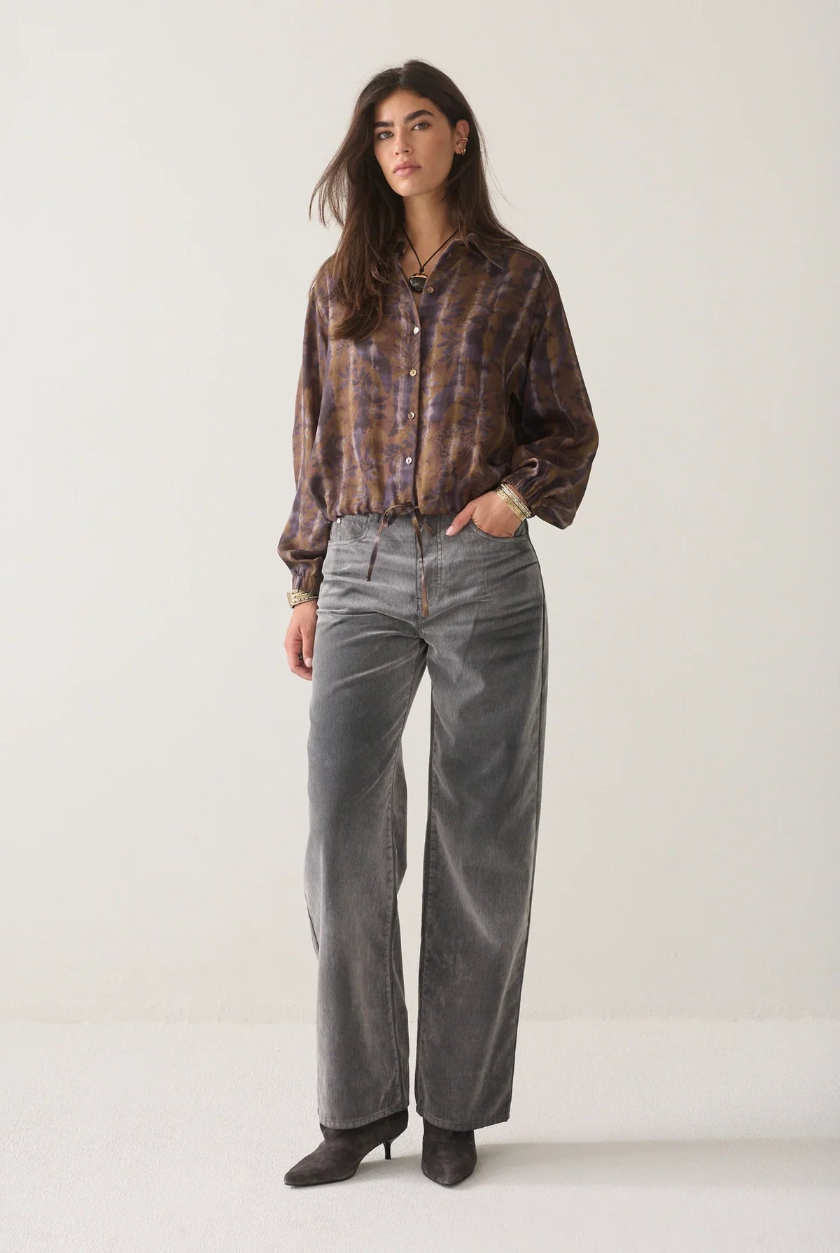 Summum brown and lilac floral cropped blouse styled with grey wide-leg trousers – full model view