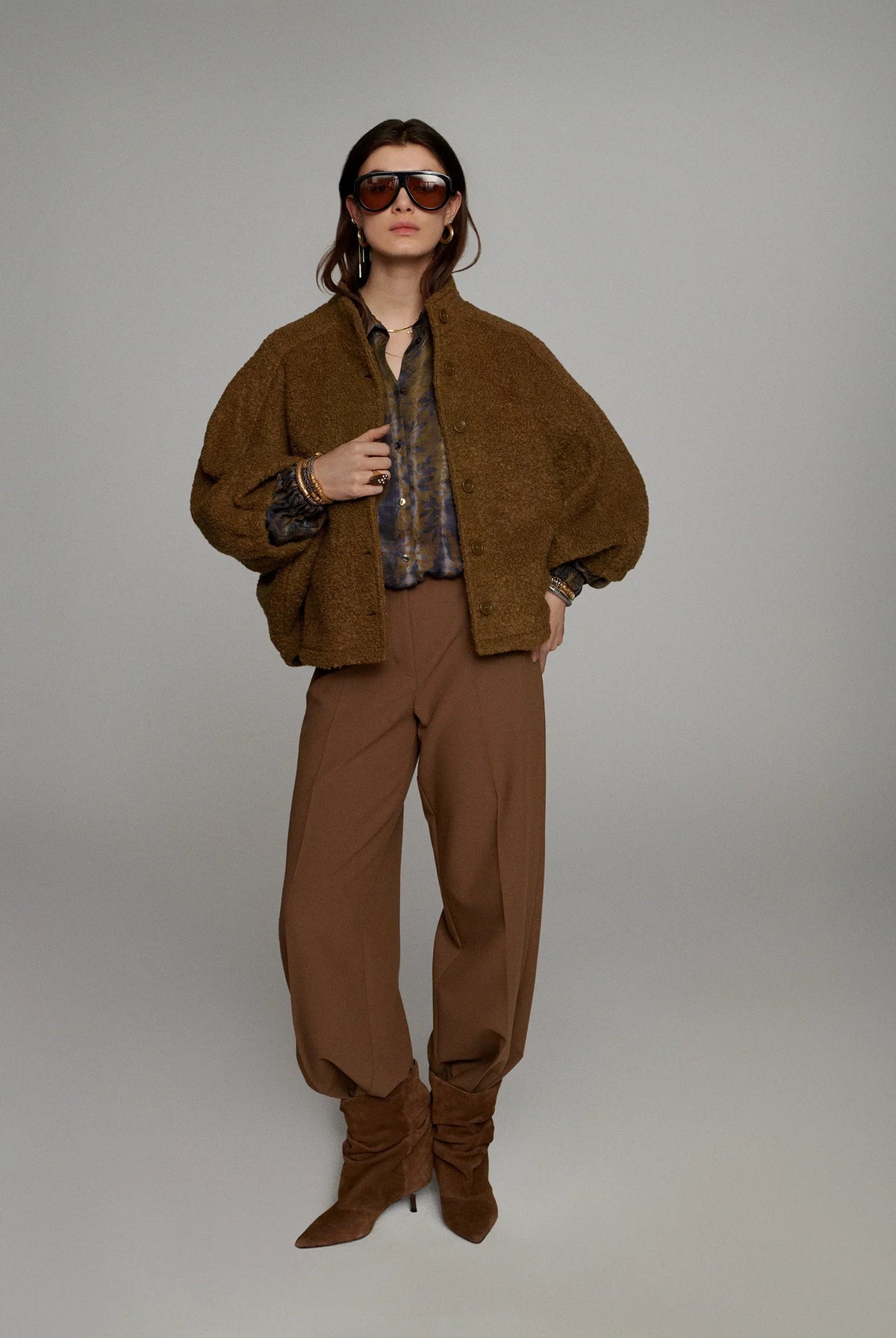 Summum Misty Flower cropped blouse layered under brown jacket with matching trousers