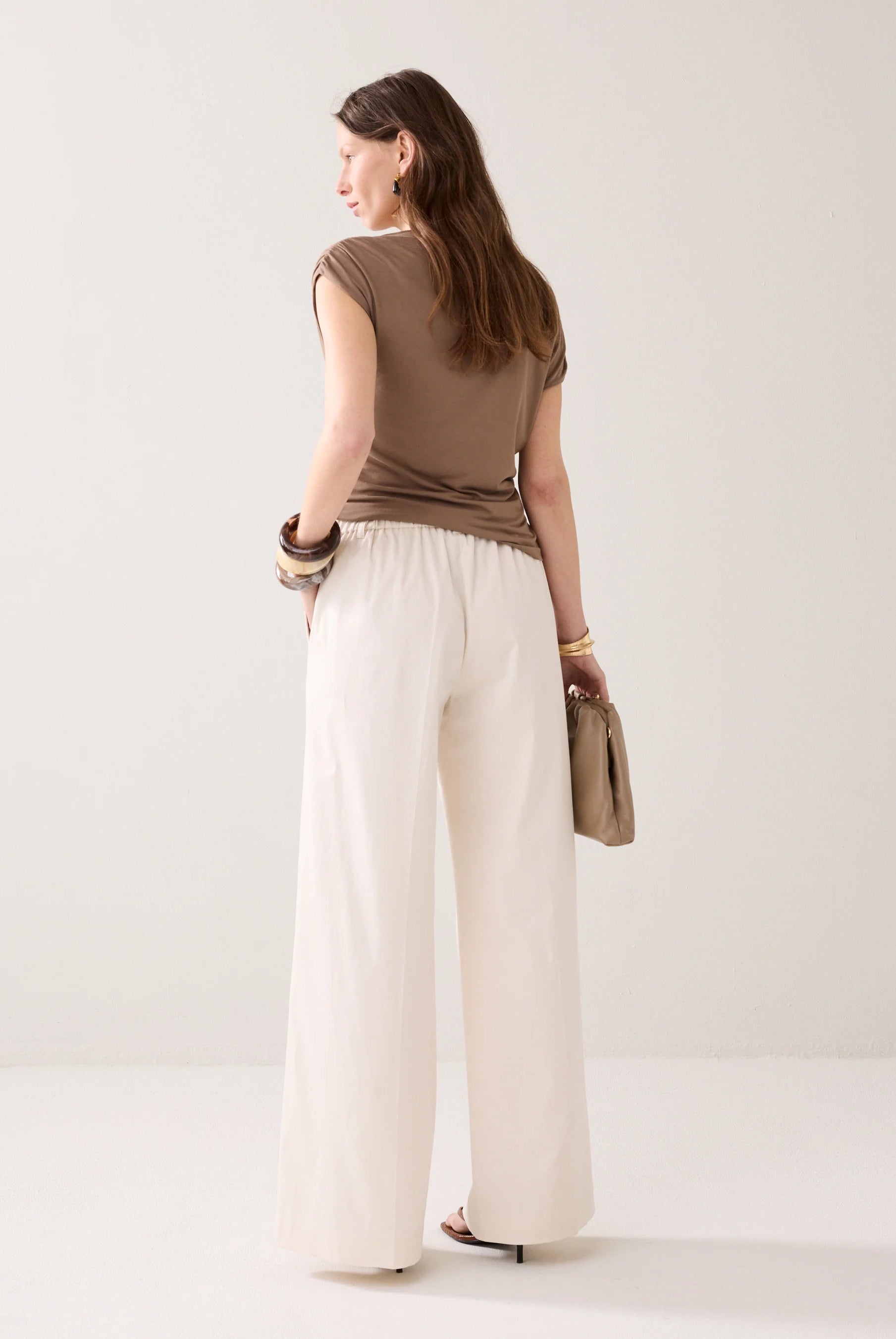 Summum cream trousers back view wide leg fit