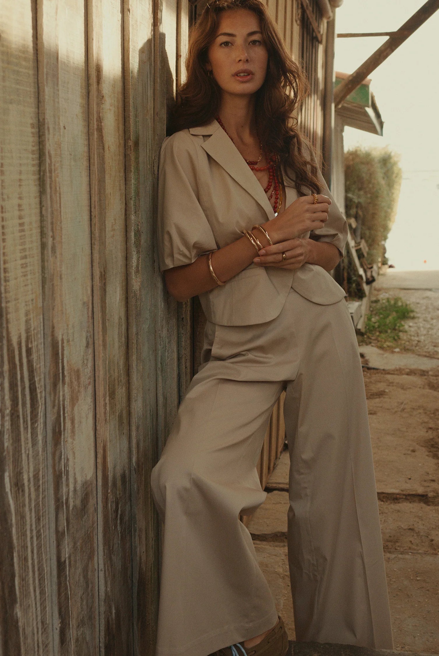 Summum cream tailored trousers styled with neutral top