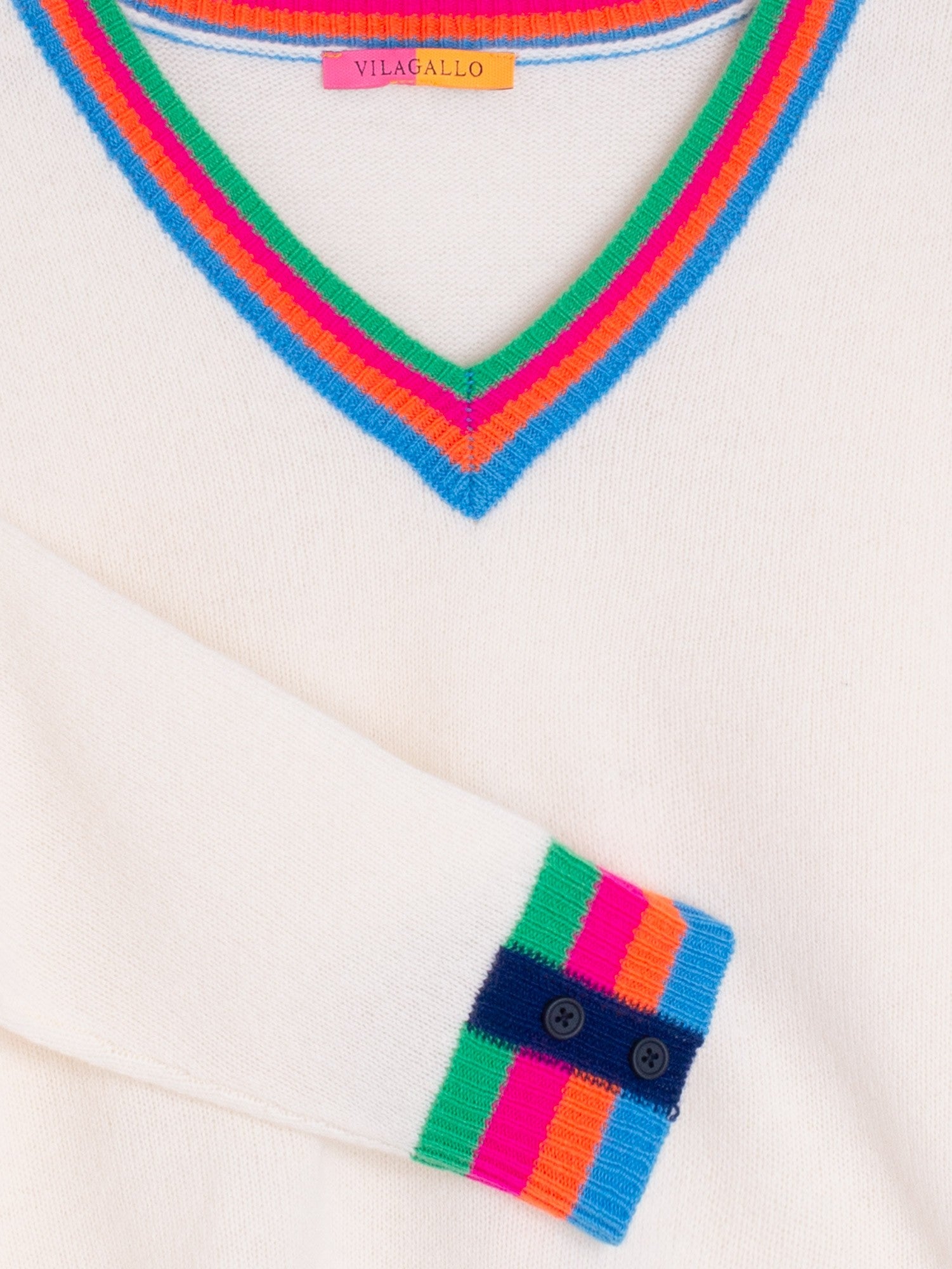 Viagallo Women’s cream wool jumper with colourful stripes and button cuff detail.