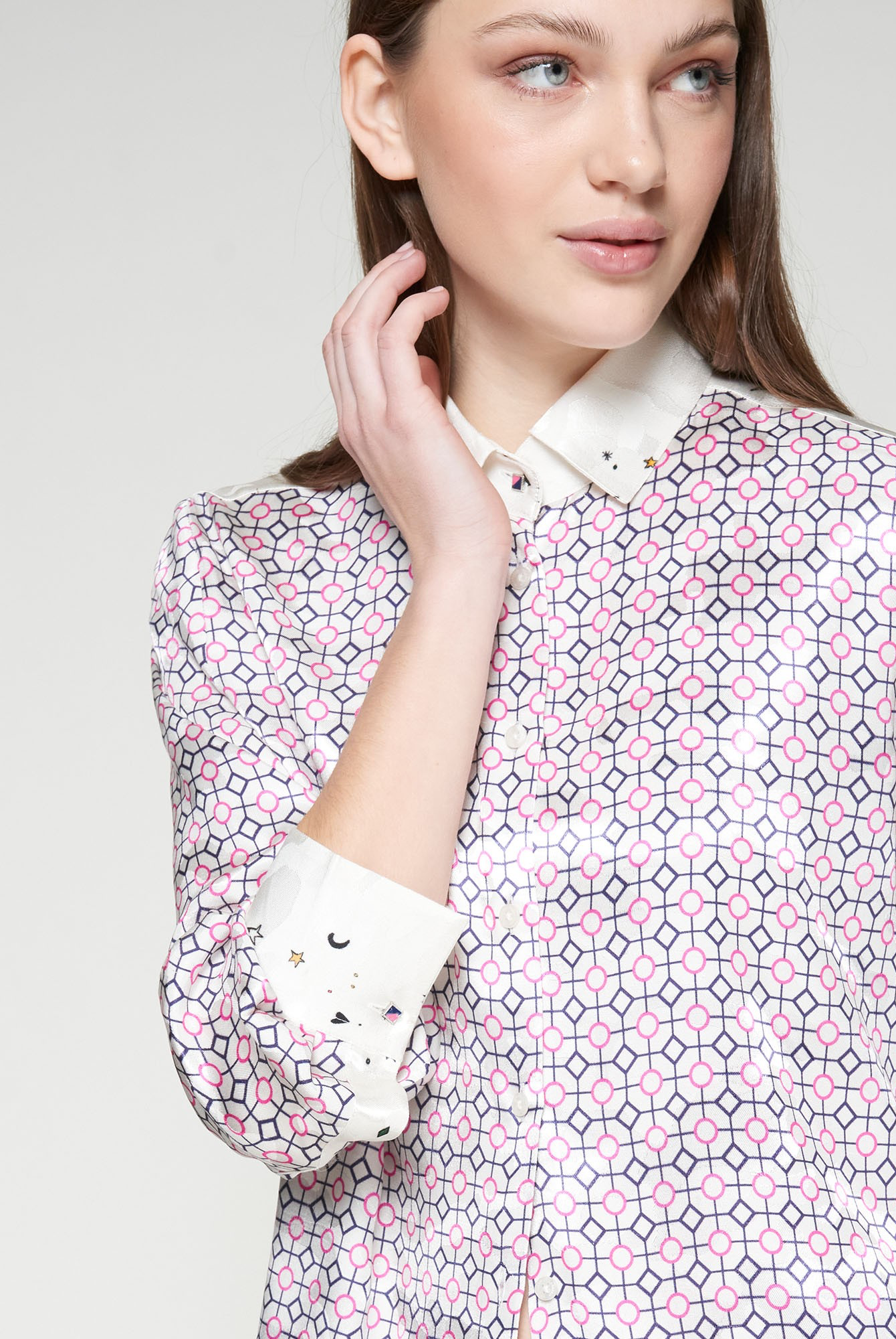 Close-up of Vilagallo shirt collar with star and moon embroidery