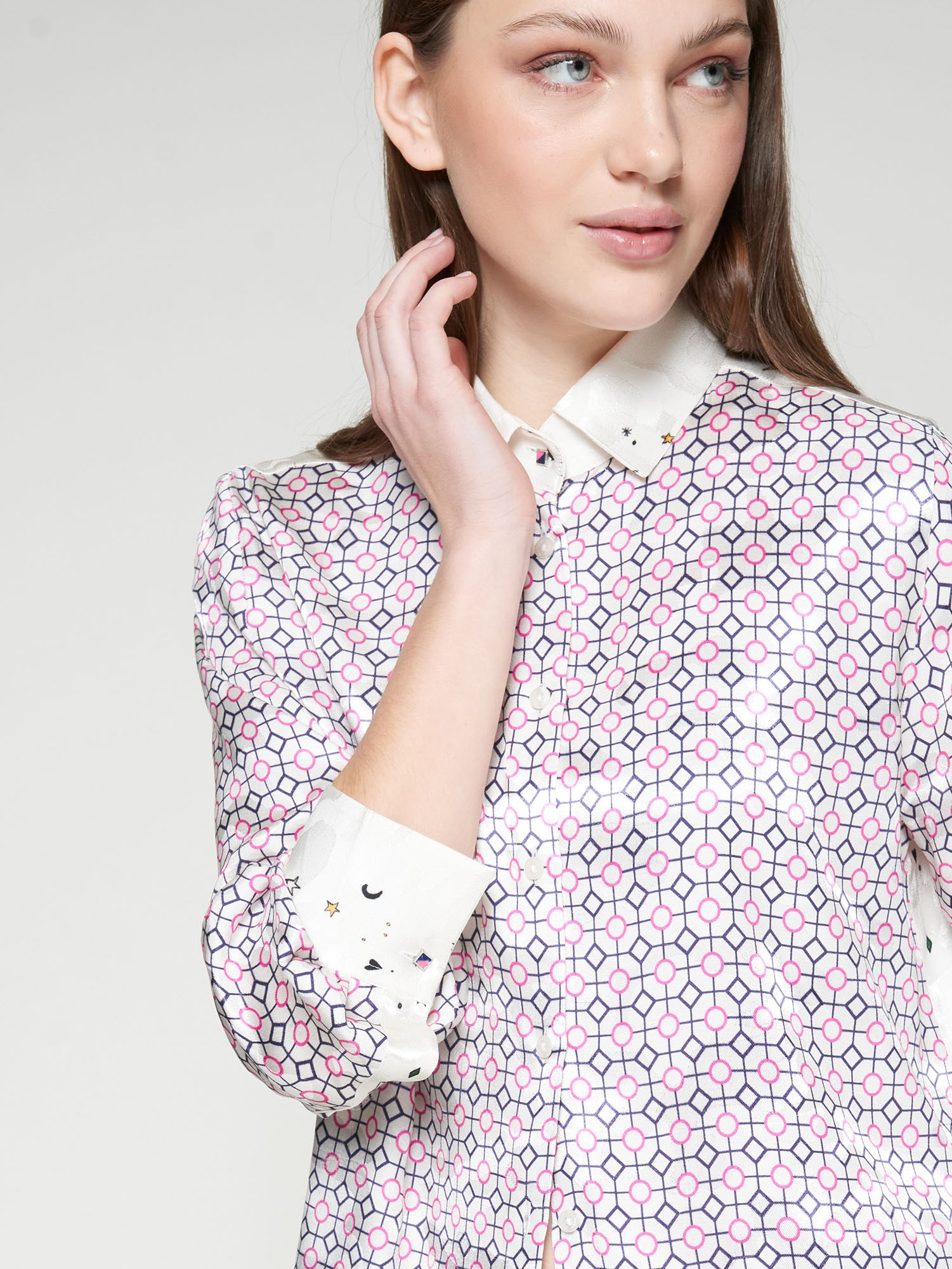 Close-up of Vilagallo shirt collar with star and moon embroidery