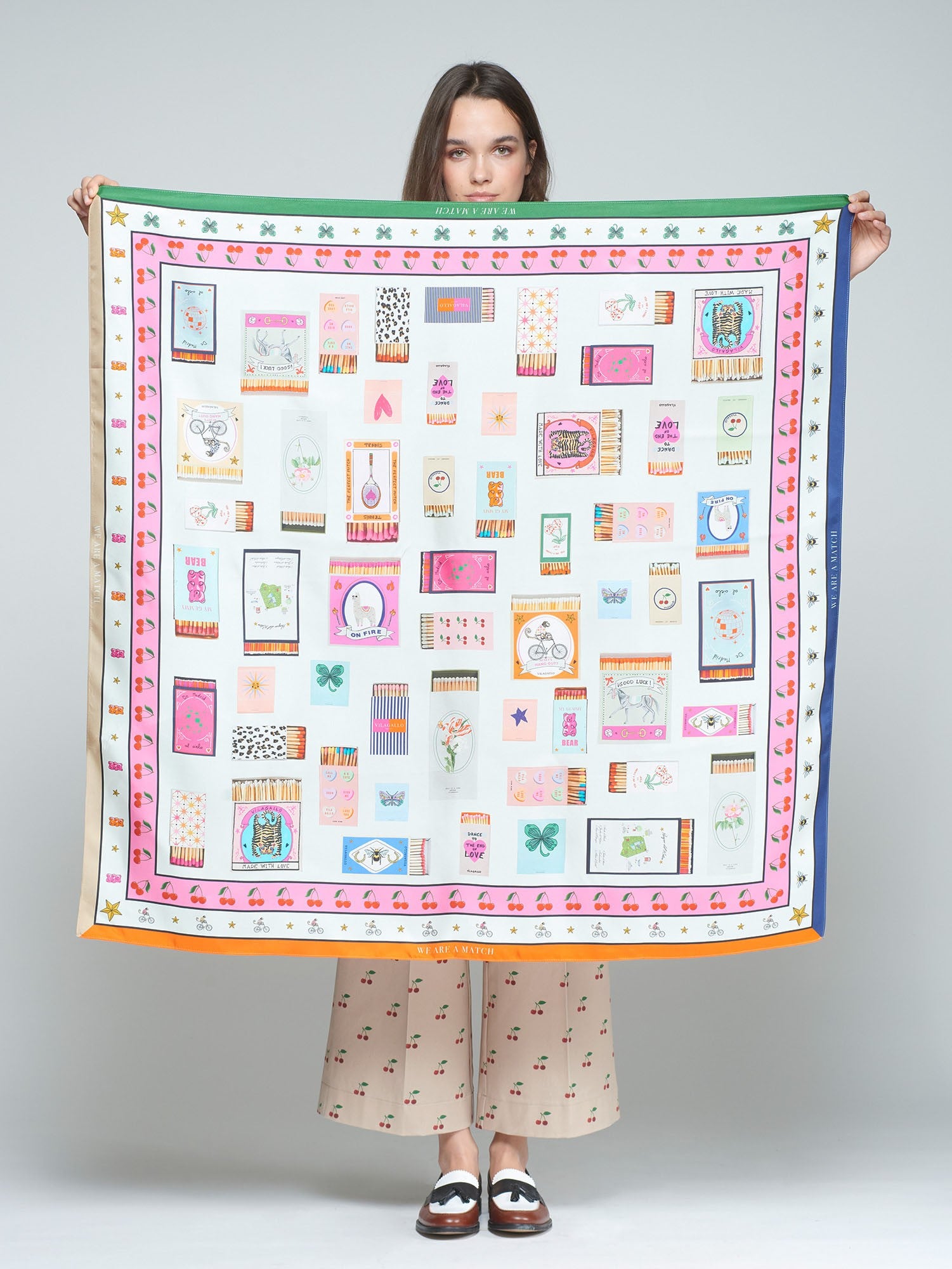 Women’s pure silk scarf with graphic borders and vivid matchbox motifs.