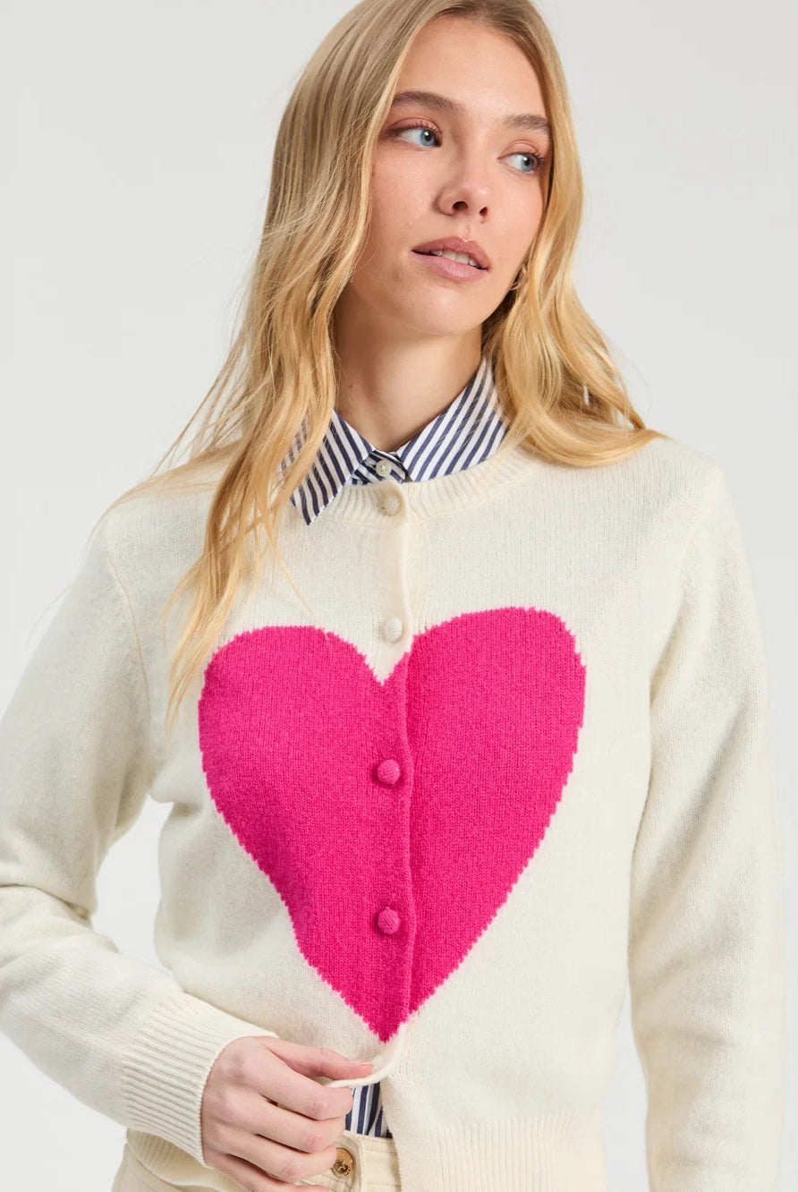 Vilagallo ecru cardigan with oversized fuchsia intarsia heart – close model view