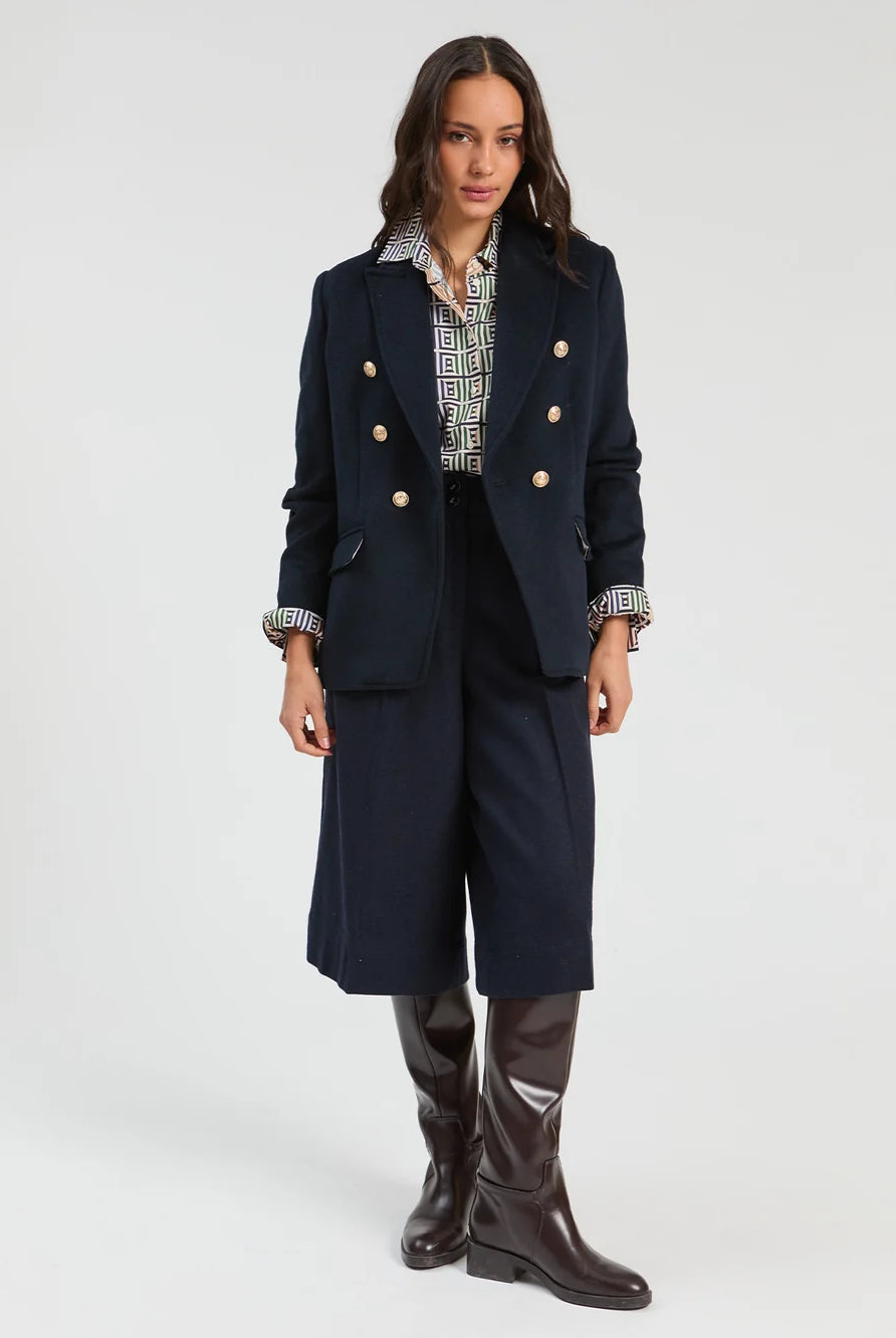 Vilagallo navy double-breasted blazer styled with printed blouse and shorts