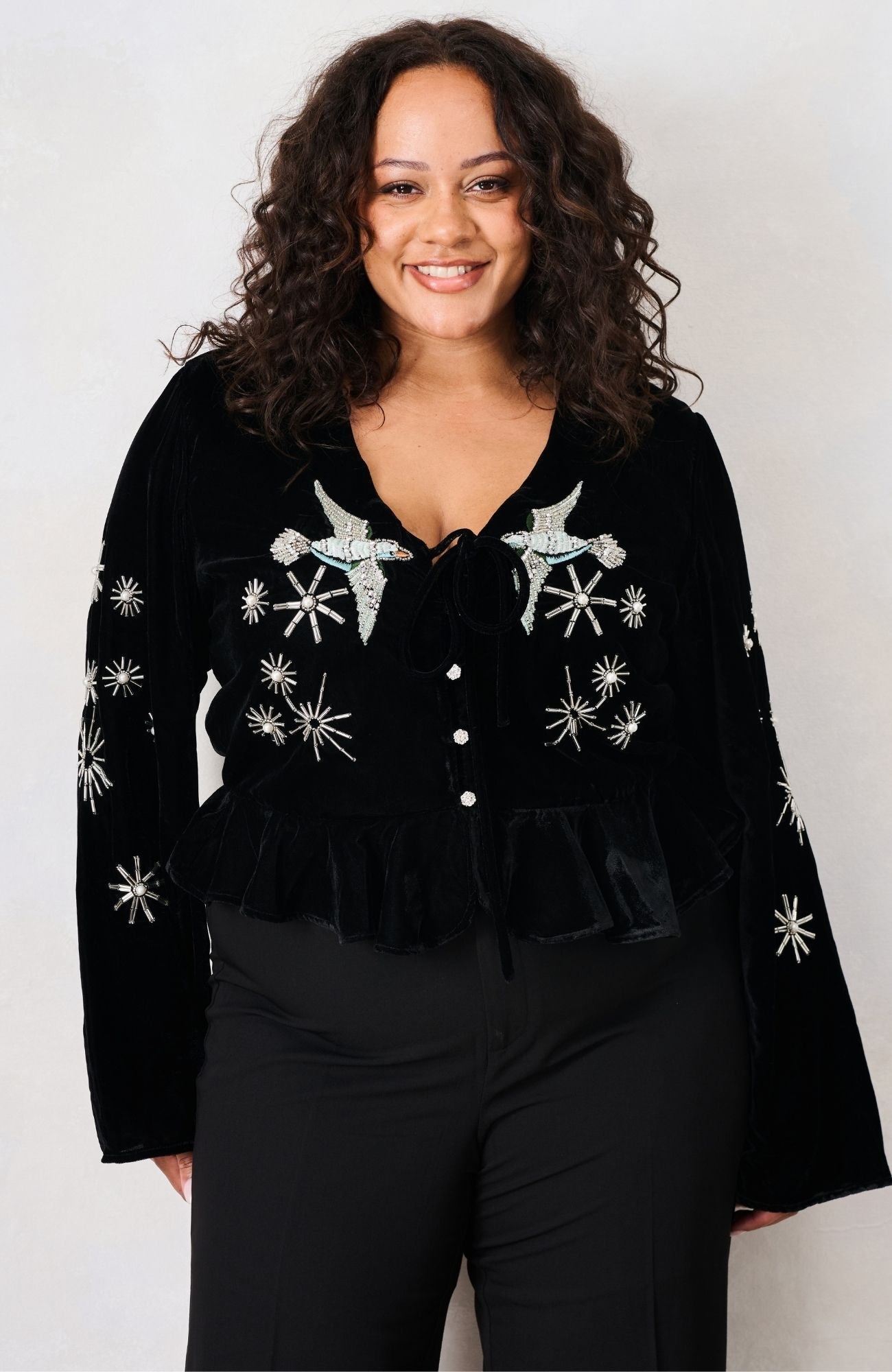 Hope & Ivy Glacia black velvet bird embellished top – front curve model view